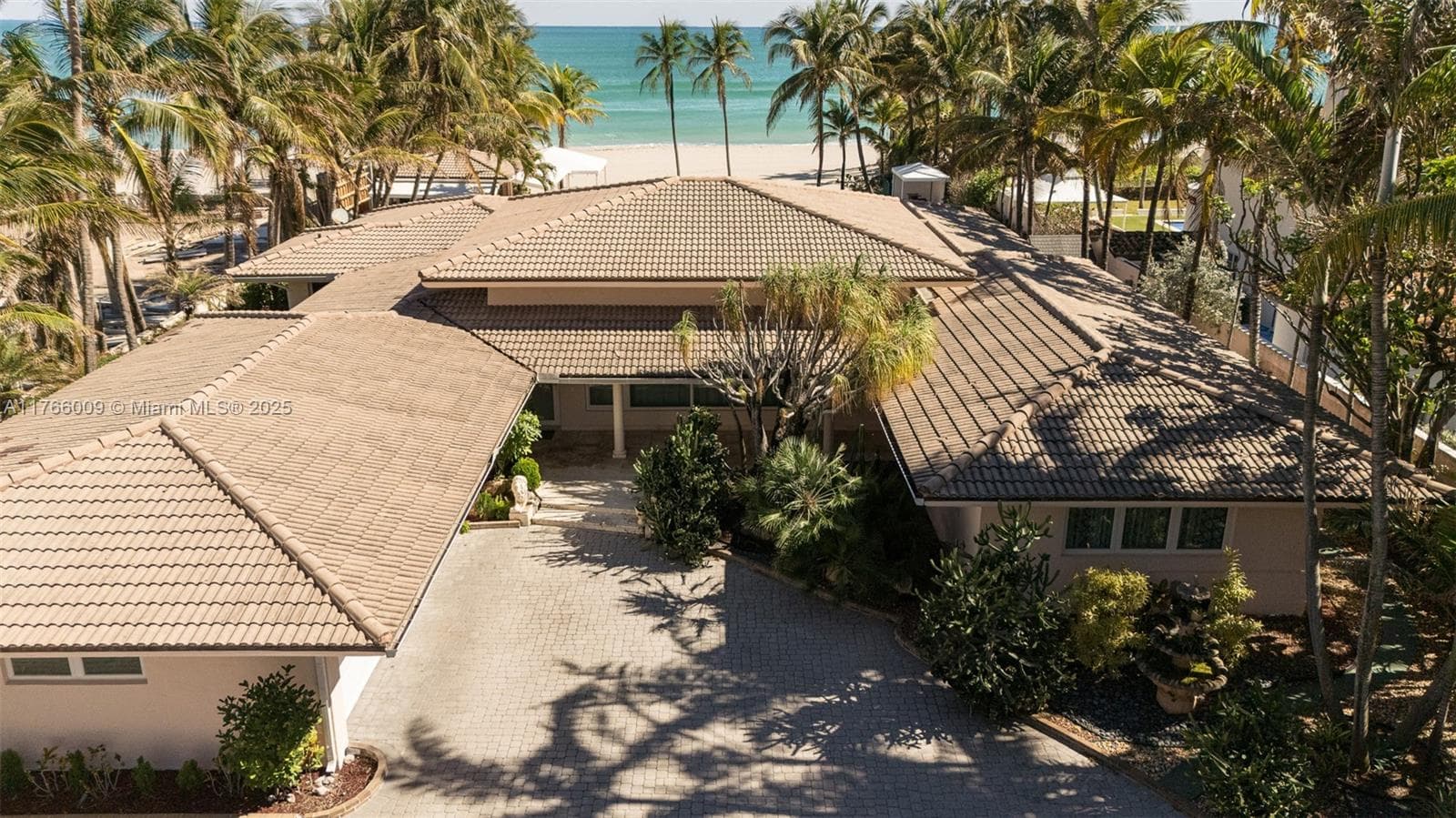 Single-family home at 205 Ocean Blvd, Golden Beach — photo 1