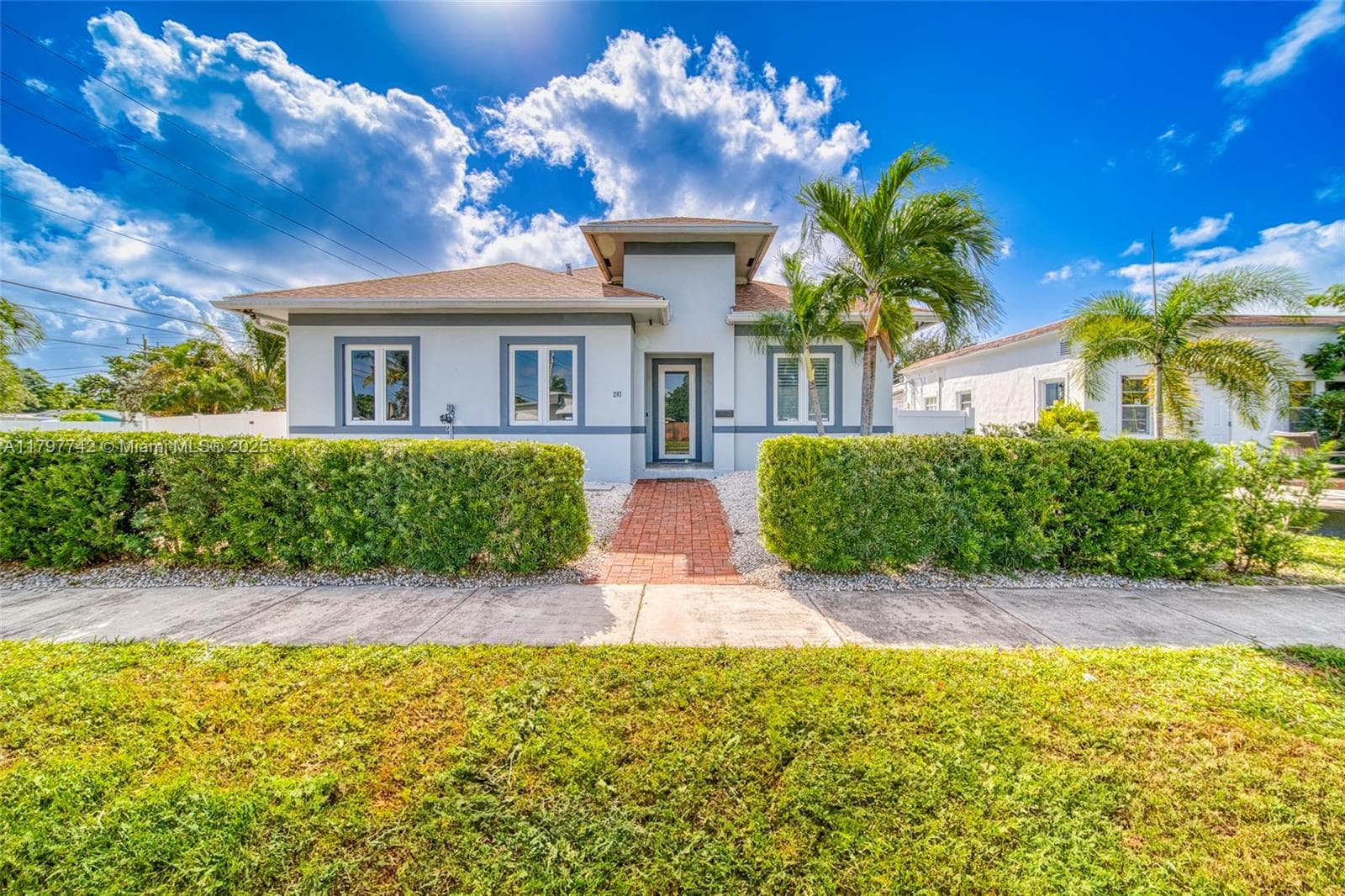 Single-family home at 207 SW 11th St, Dania Beach, FL