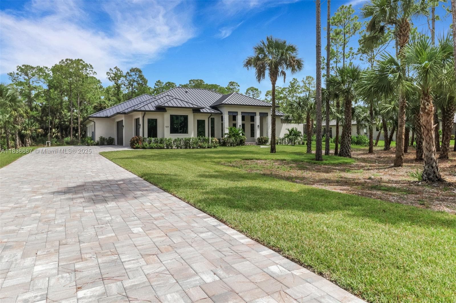 Single-family home at 524 13th St Sw, Naples, FL