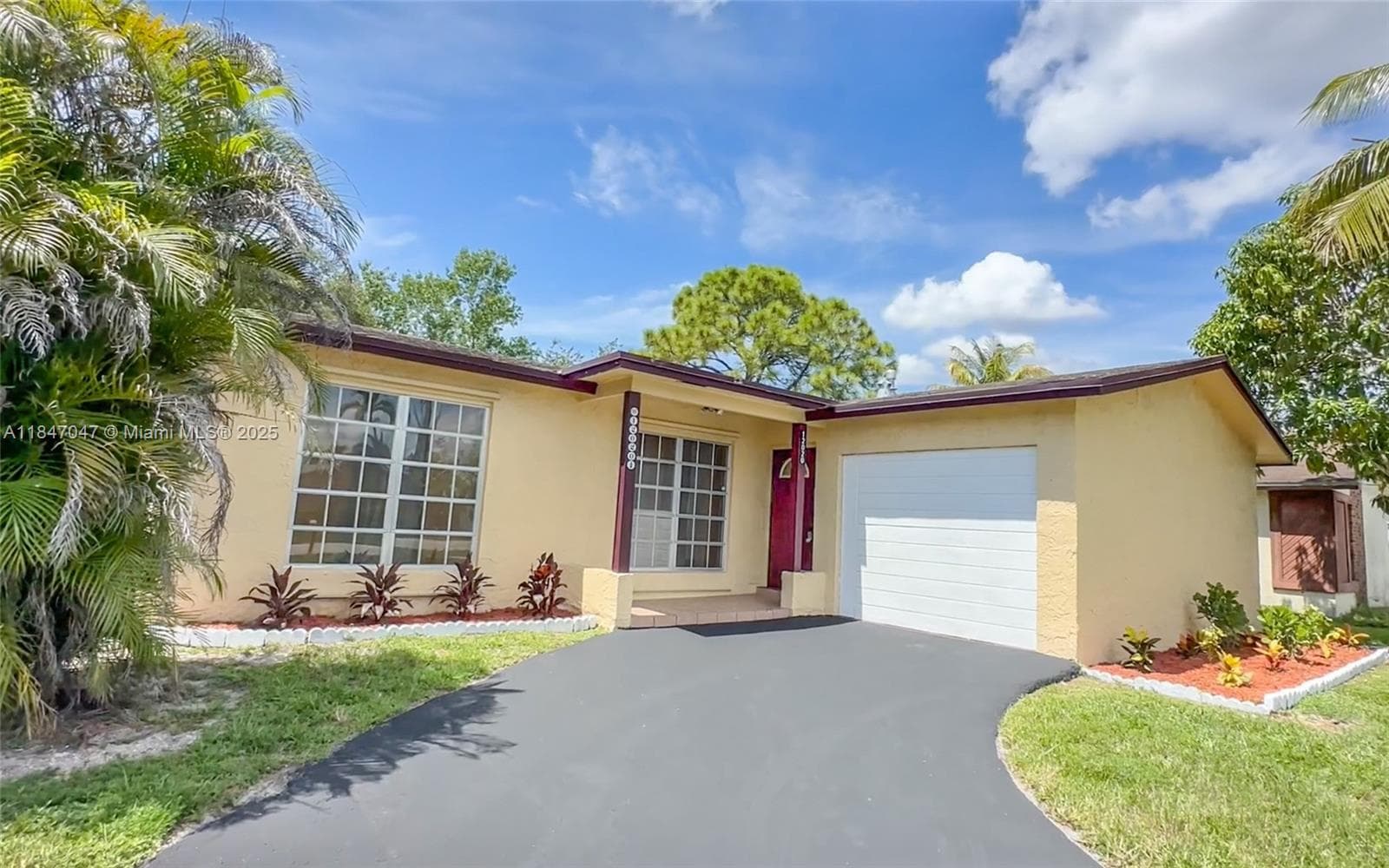 Single-family home at 12020 NW 34th Pl, Sunrise, FL