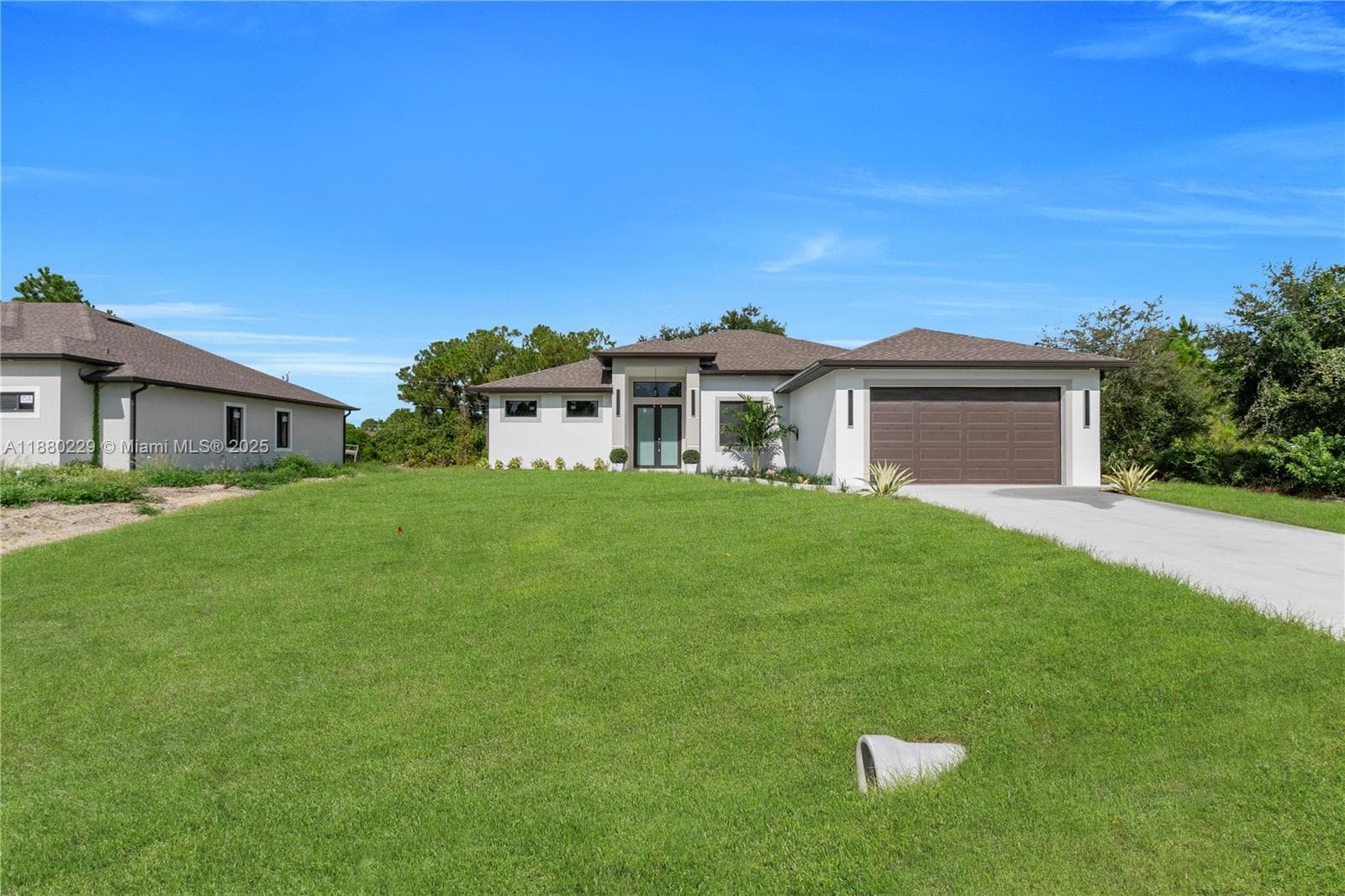 Single-family home at 1913 IRVING AVE, Lehigh Acres, FL