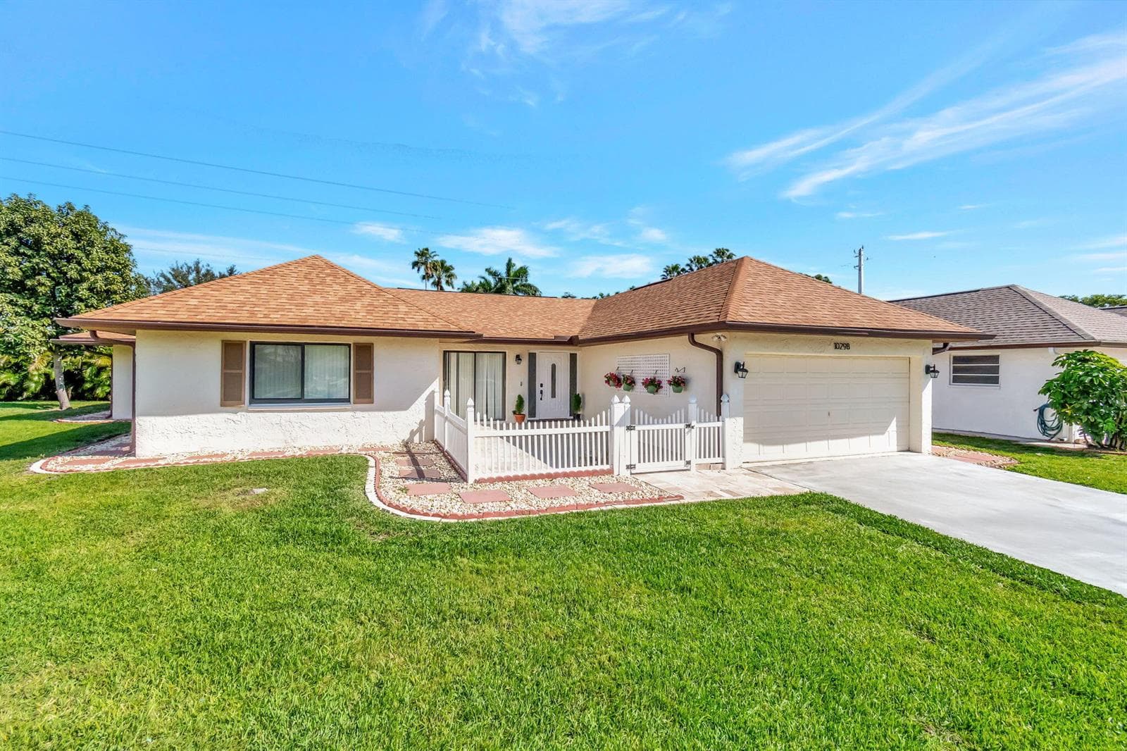 Single-family home at 10298 Greentrail Drive N, Boynton Beach, FL