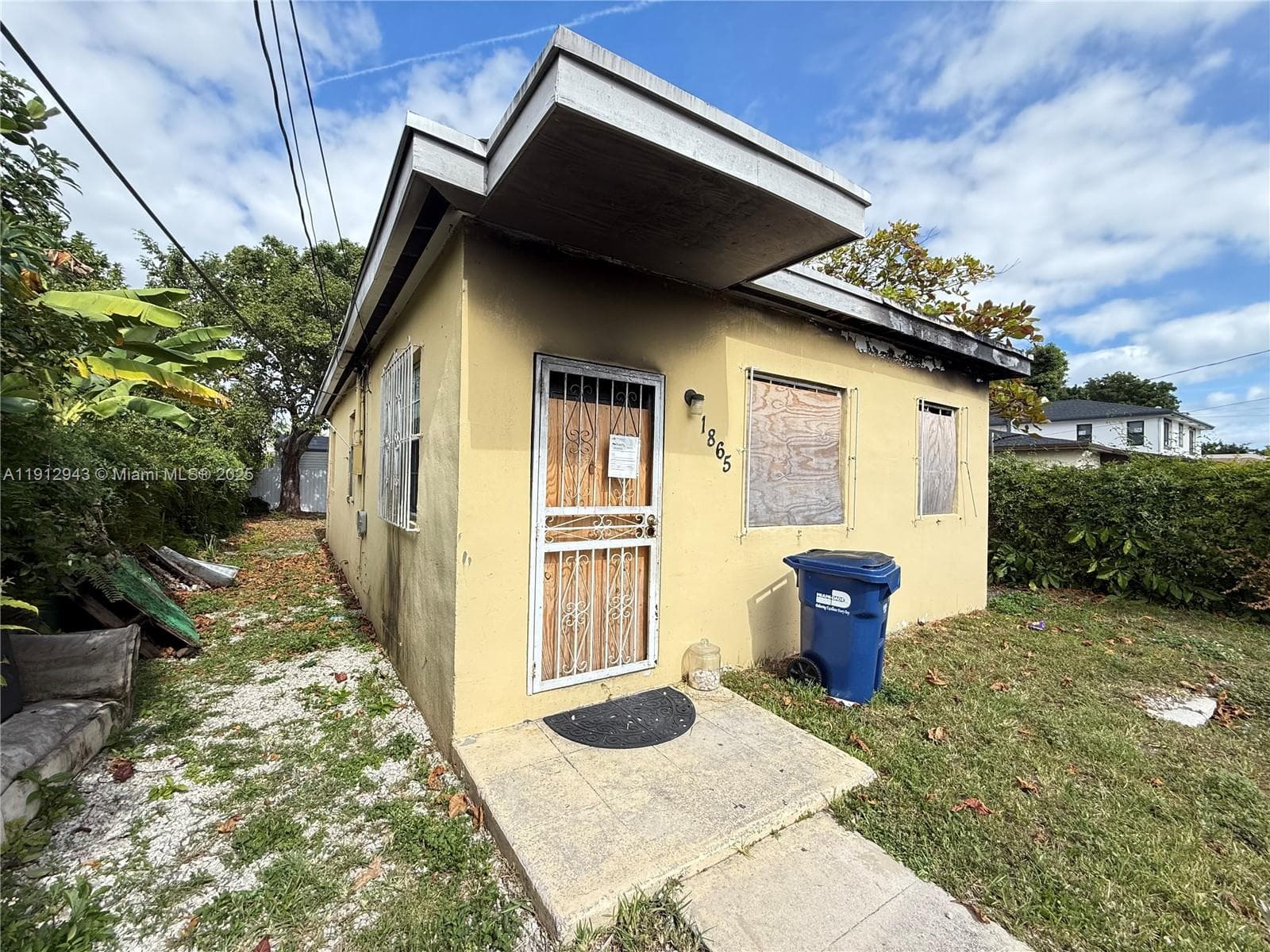 Single-family home at 1865 NW 70th St, Miami — photo 1