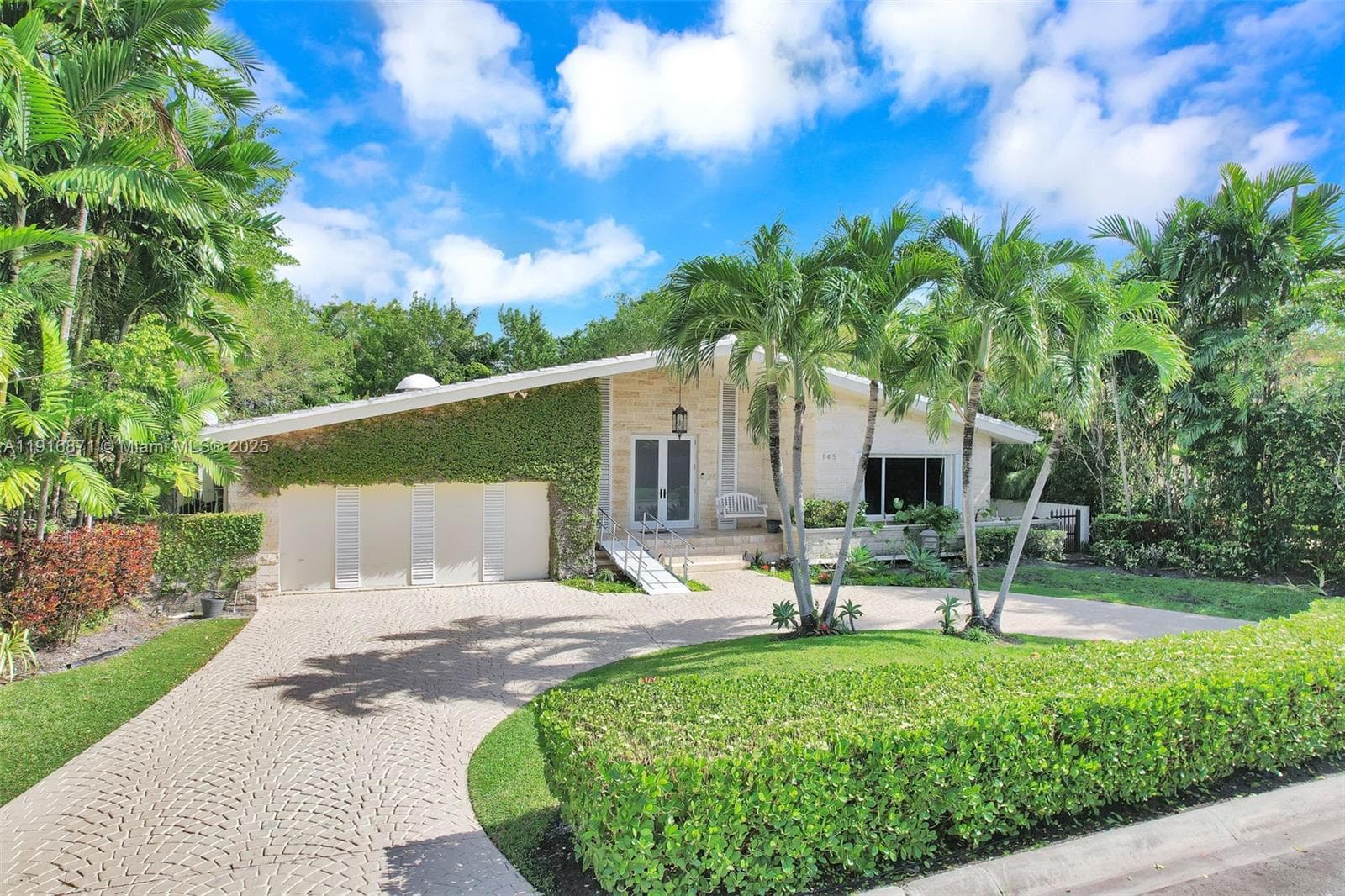 Single-family home at 145 Bal Bay Dr, Bal Harbour, FL
