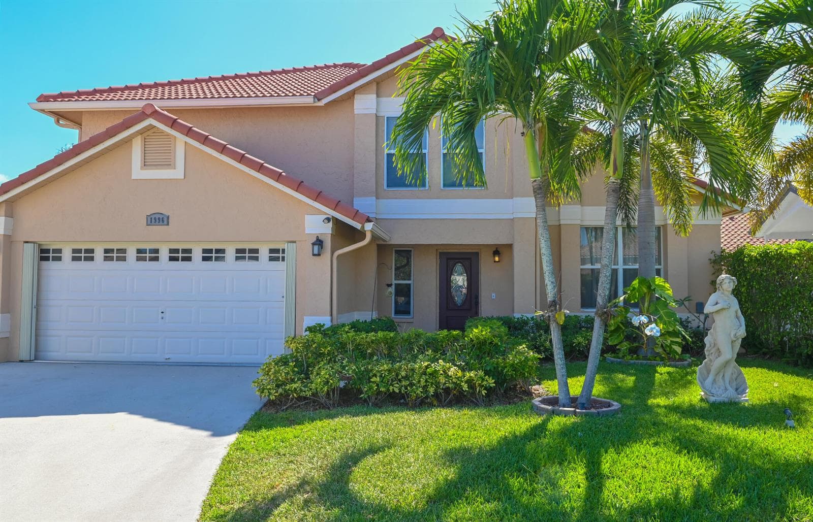 Single-family home at 1996 Lake Breeze Court, Wellington, FL