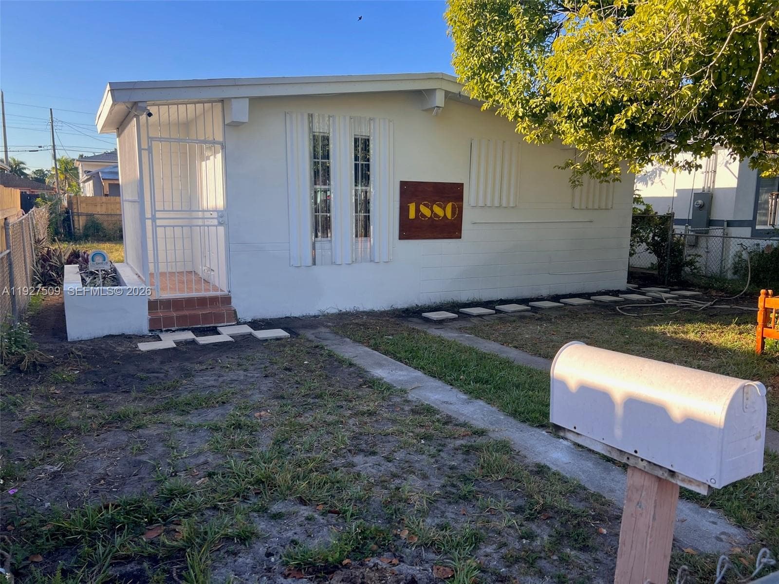 Single-family home at 1880 NW 68th Ter, Miami, FL