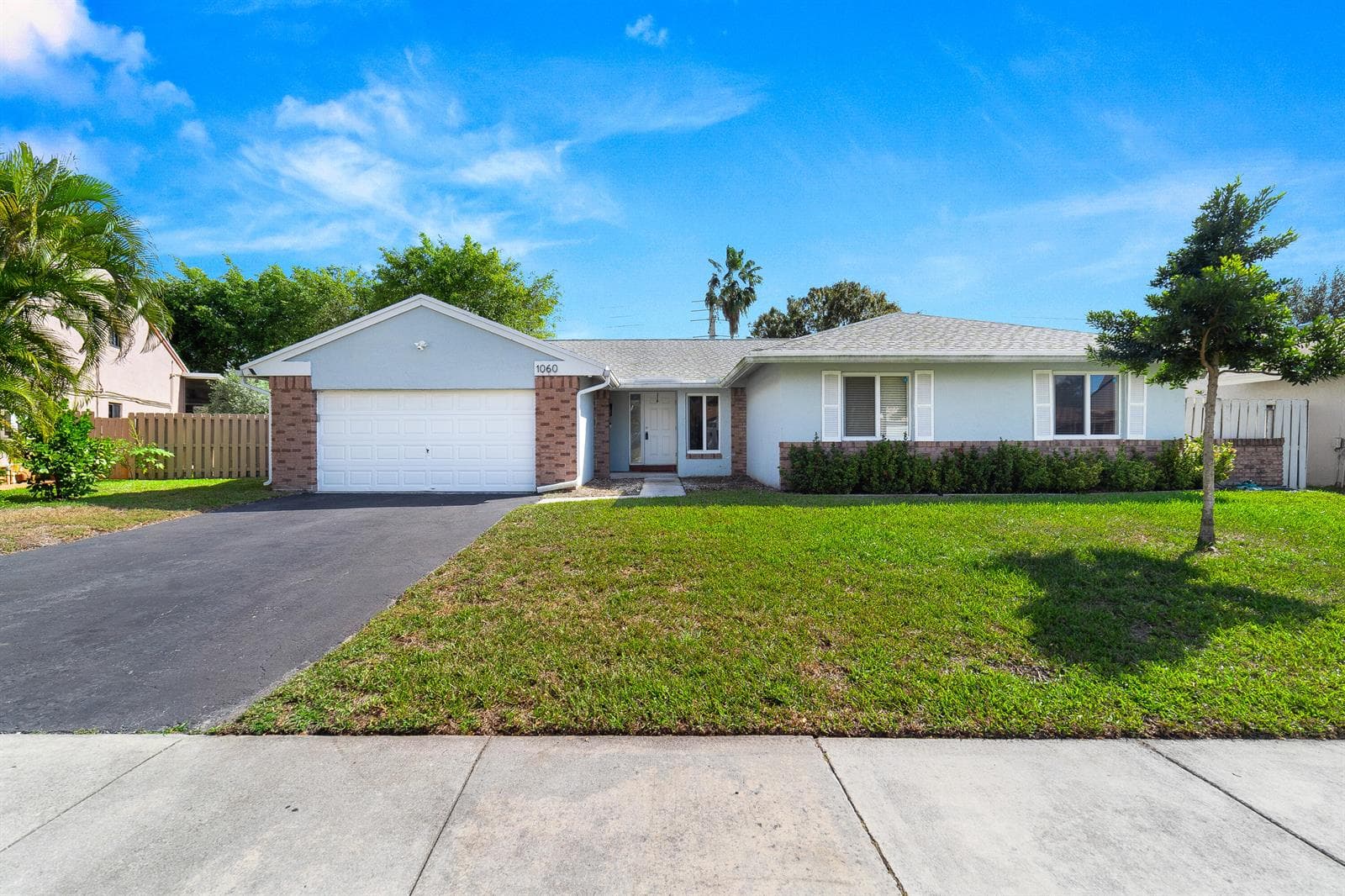 Single-family home at 1060 Cedar Creek Way, Davie, FL