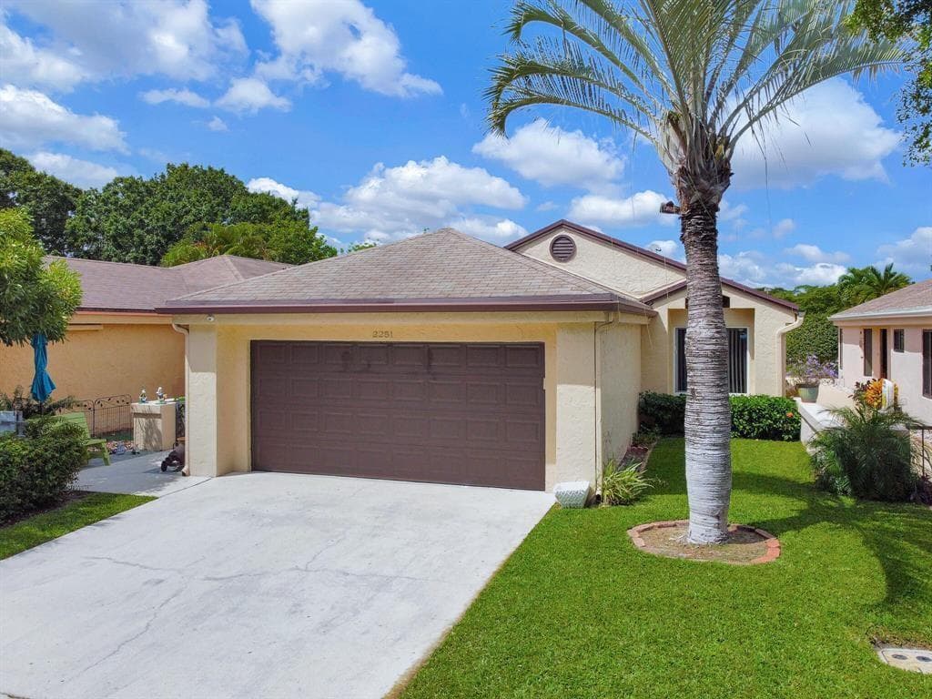Single-family home at 2251 NW 34th Terrace, Coconut Creek, FL