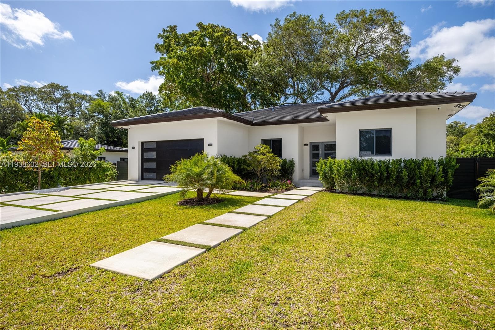 Single-family home at 1030 NE 121st St, Biscayne Park, FL