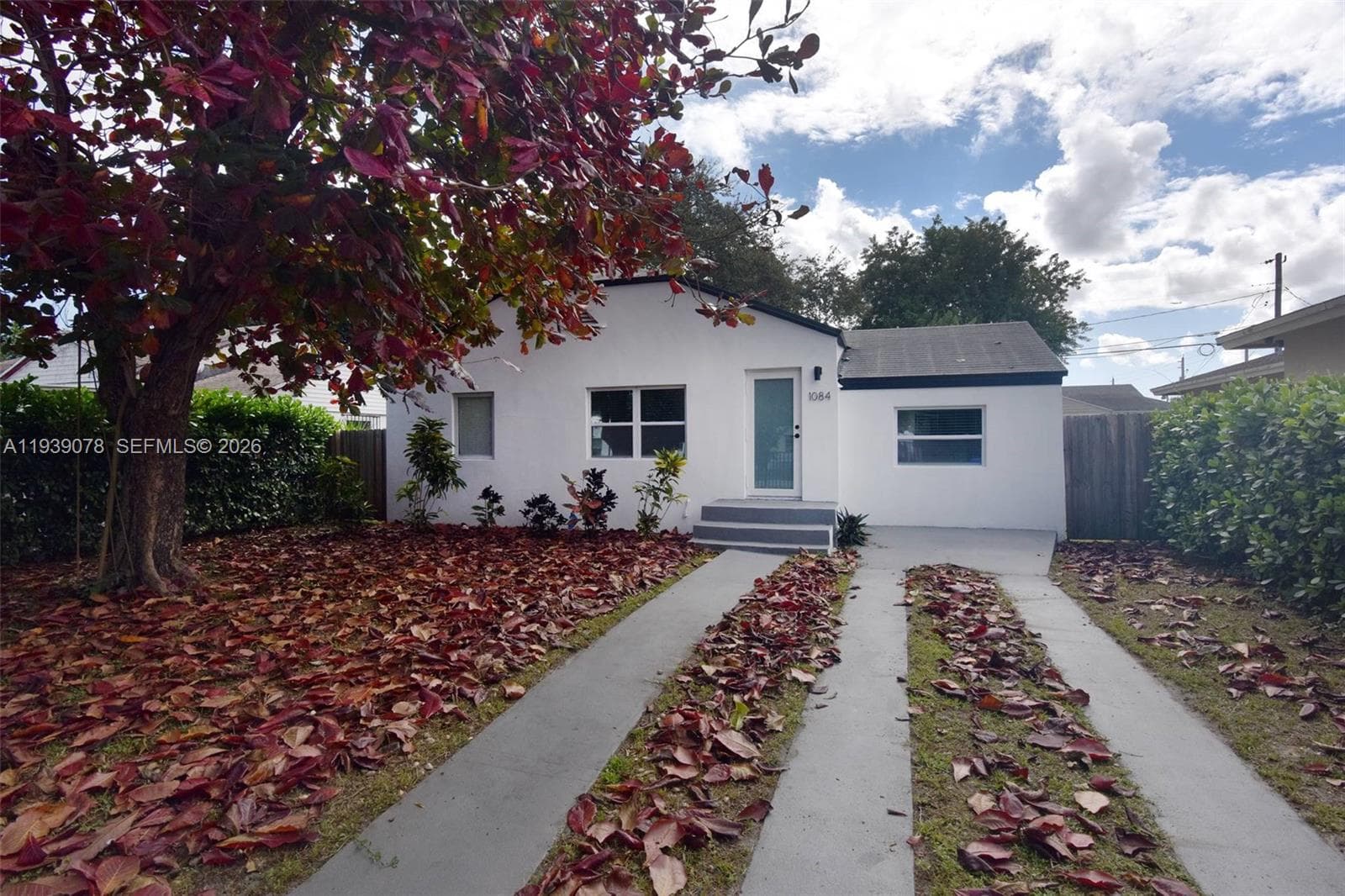 Single-family home at 1084 NW 66th St, Miami, FL