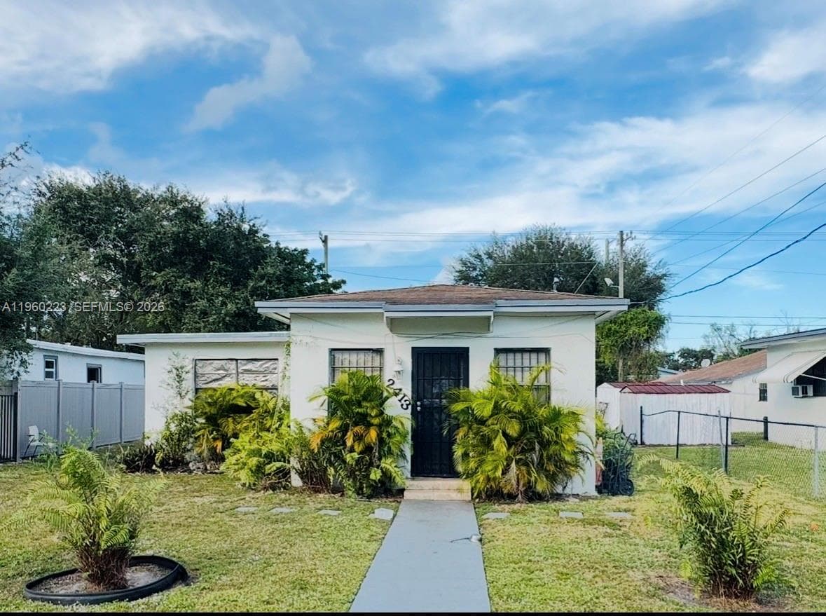 Single-family home at 2413 NW 66th St, Miami, FL