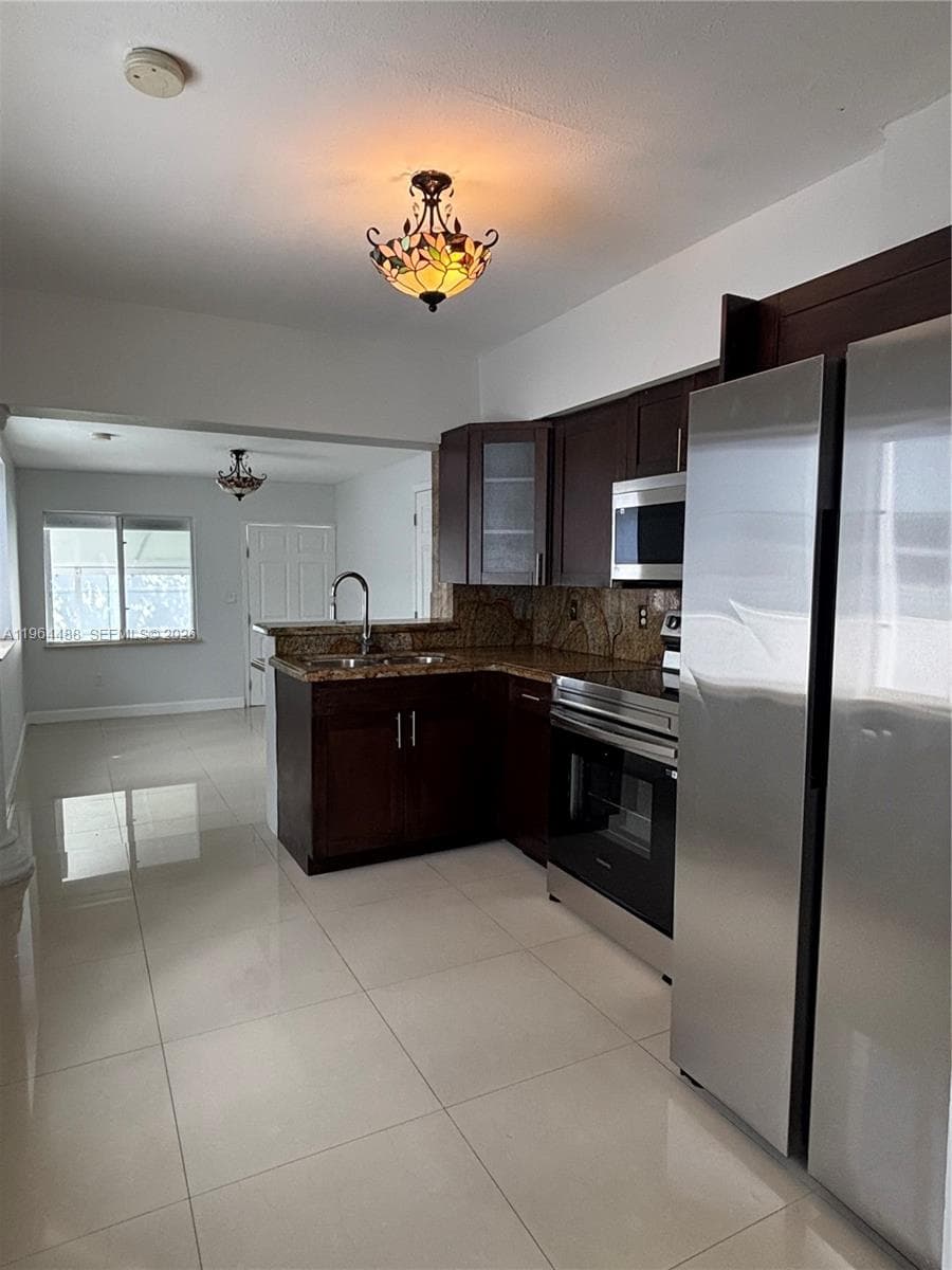 Single-family home at 6823 SW 25th St, Miami — photo 2