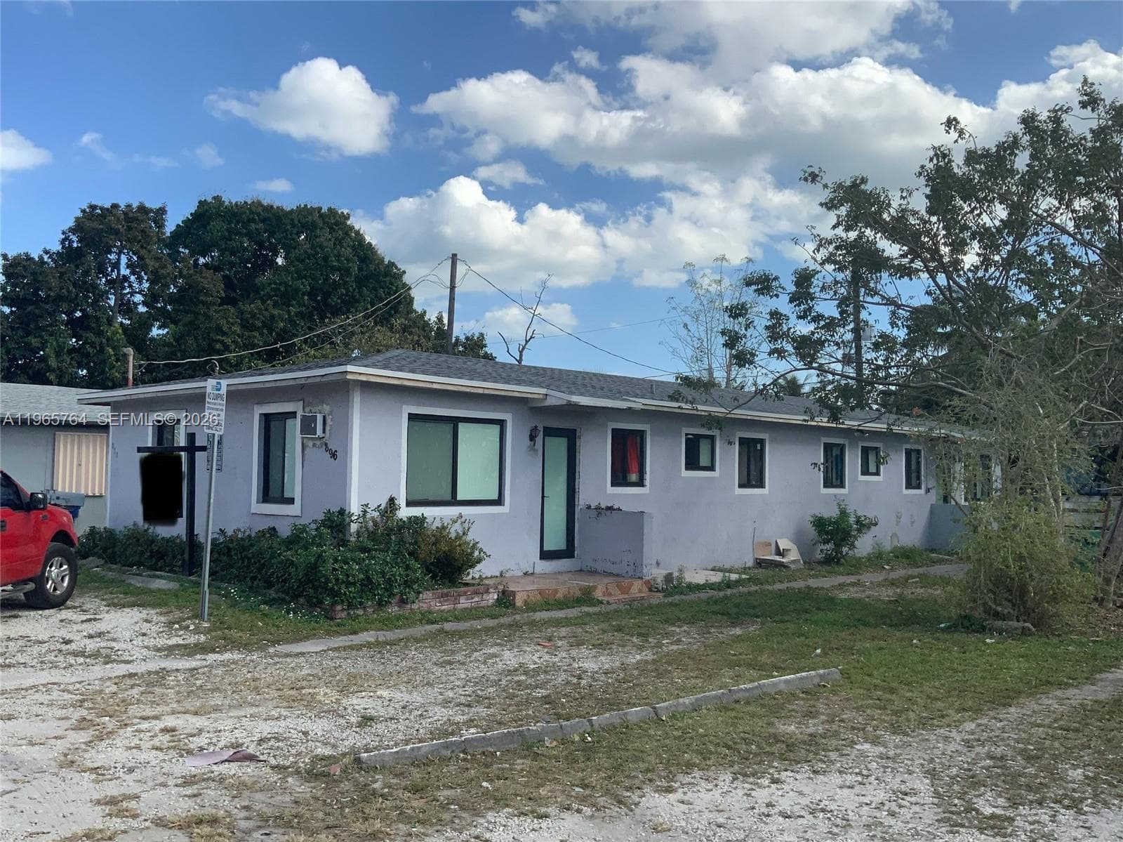 Single-family home at 896 NW 103rd St, Miami, FL