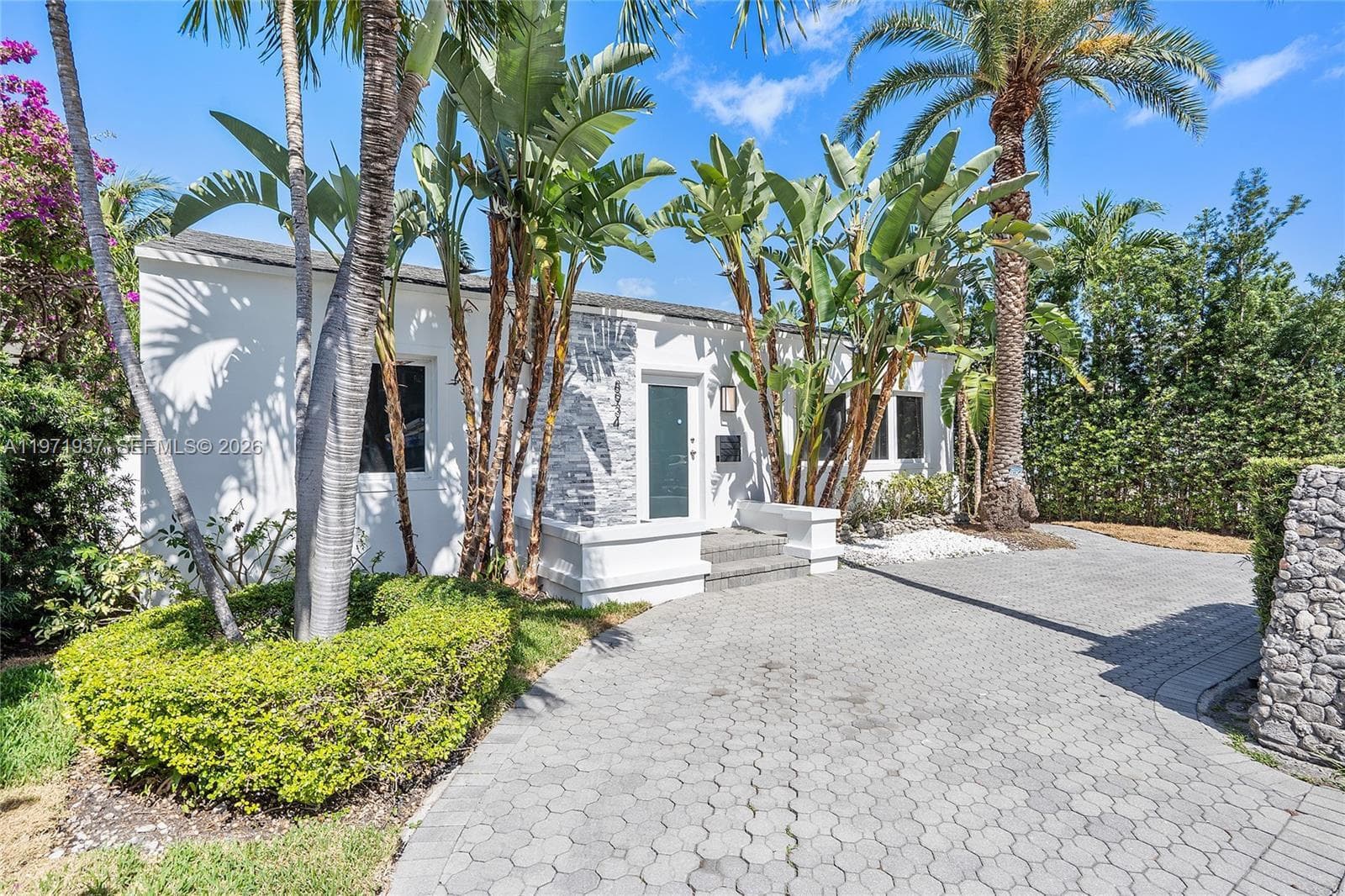 Single-family home at 8934 Harding Ave, Surfside — photo 1