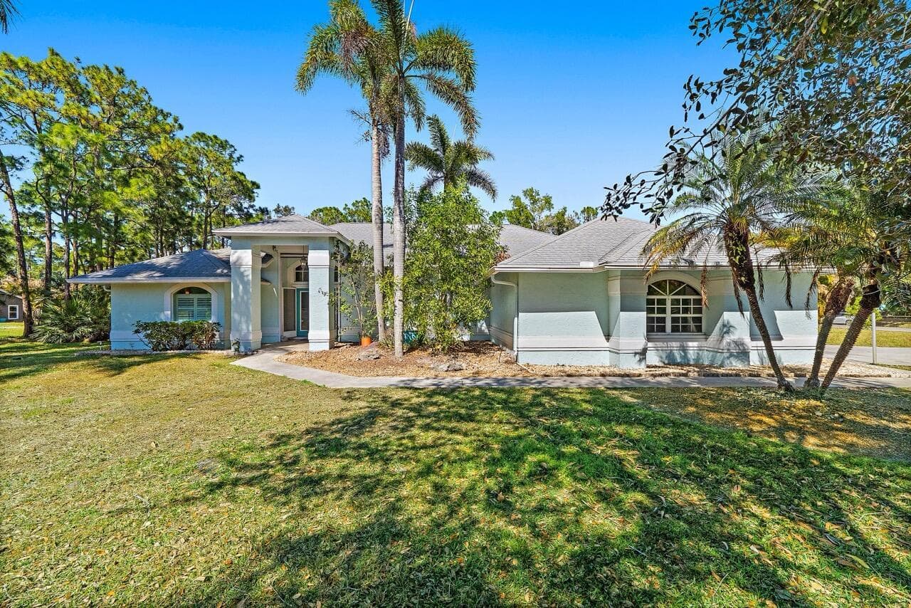 Single-family home at 13033 Randolph Siding Road N, Jupiter, FL