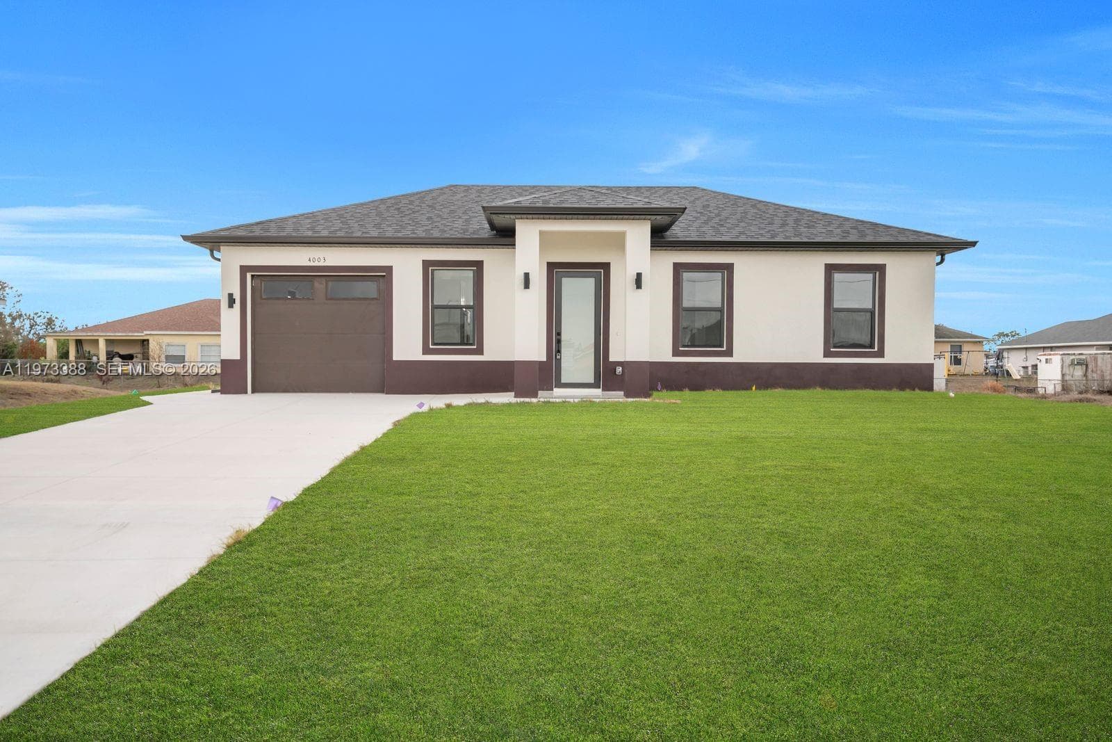 Single-family home at 4003 10th ST SW, Lehigh Acres, FL