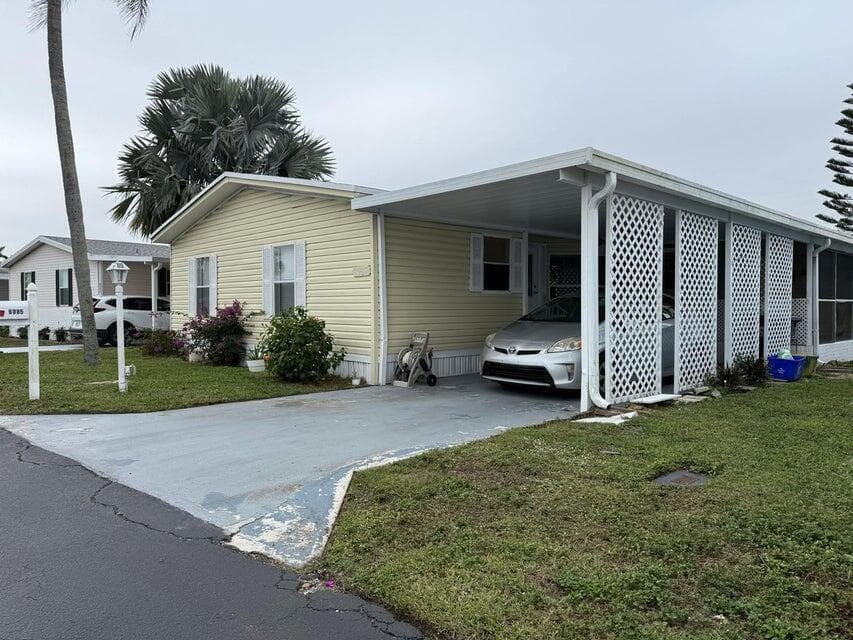 Home at 6085 Seashore Drive, Atlantis, FL