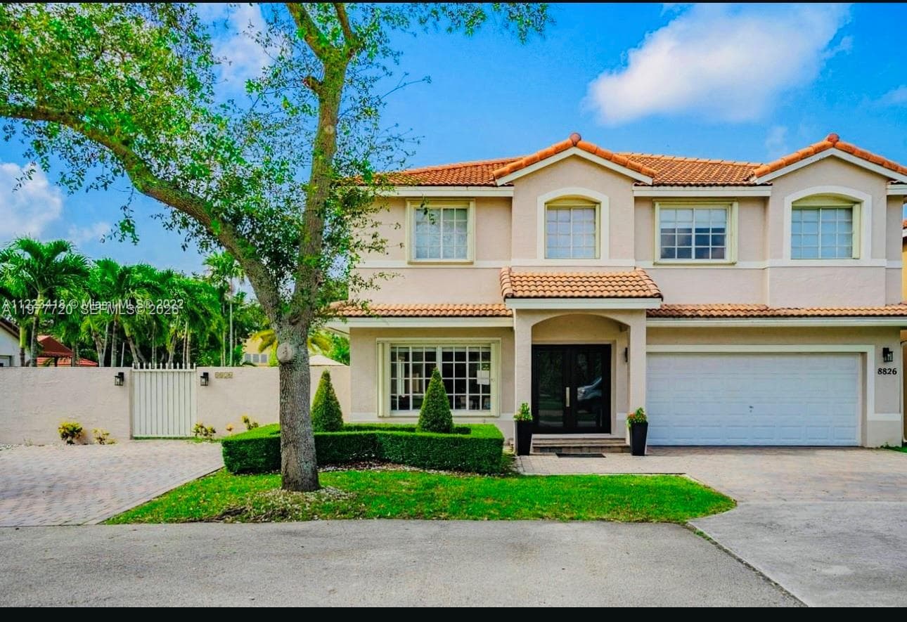 Single-family home at 8826 NW 189th Ter, Hialeah — photo 2