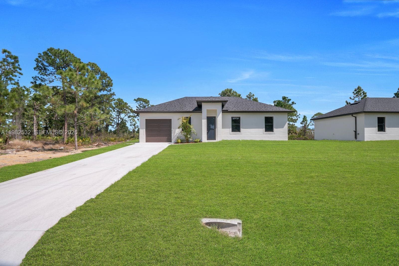 Single-family home at 635 Summit Ave S, Lehigh Acres, FL