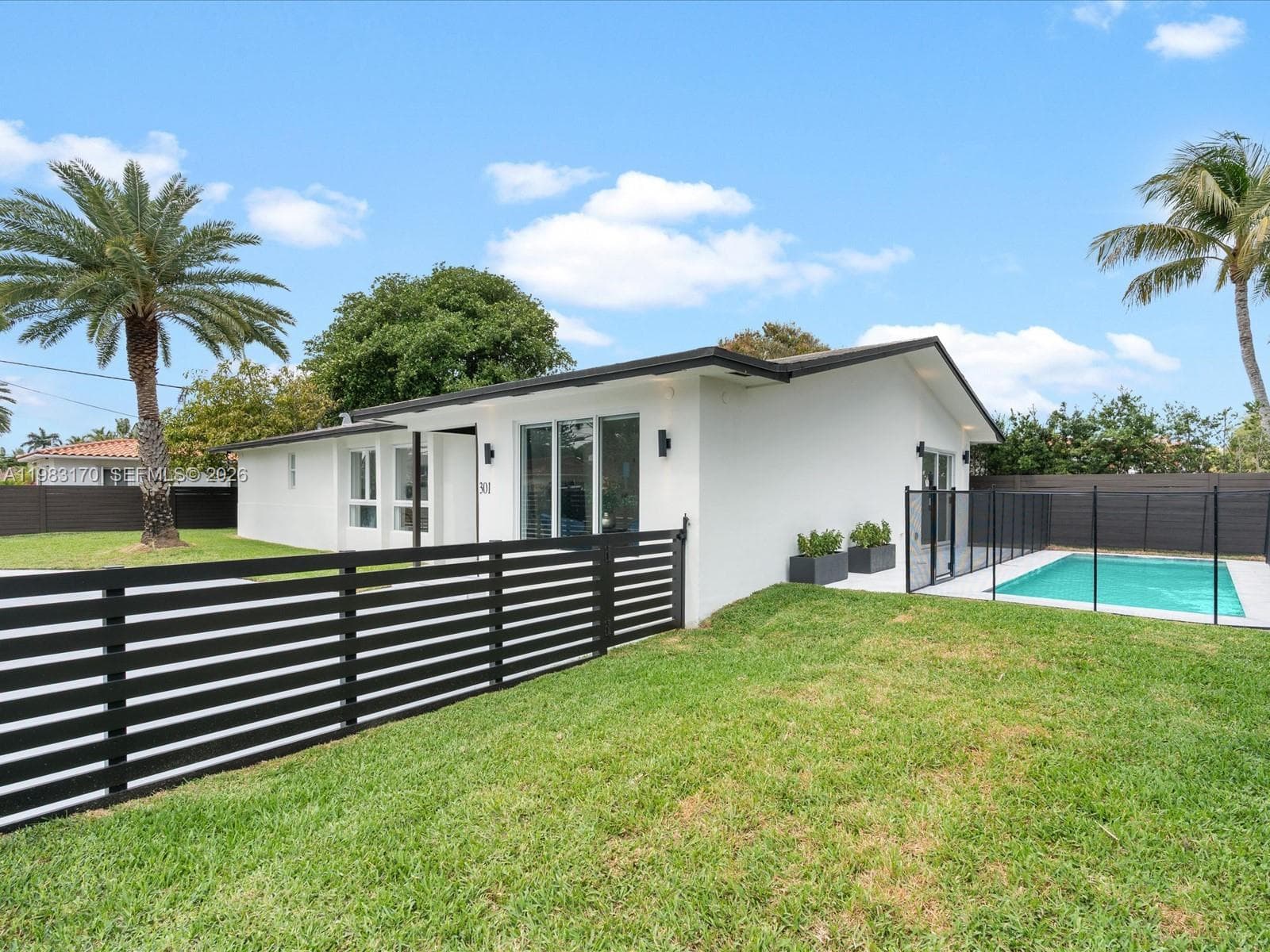 Single-family home at 301 88th St, Surfside, FL