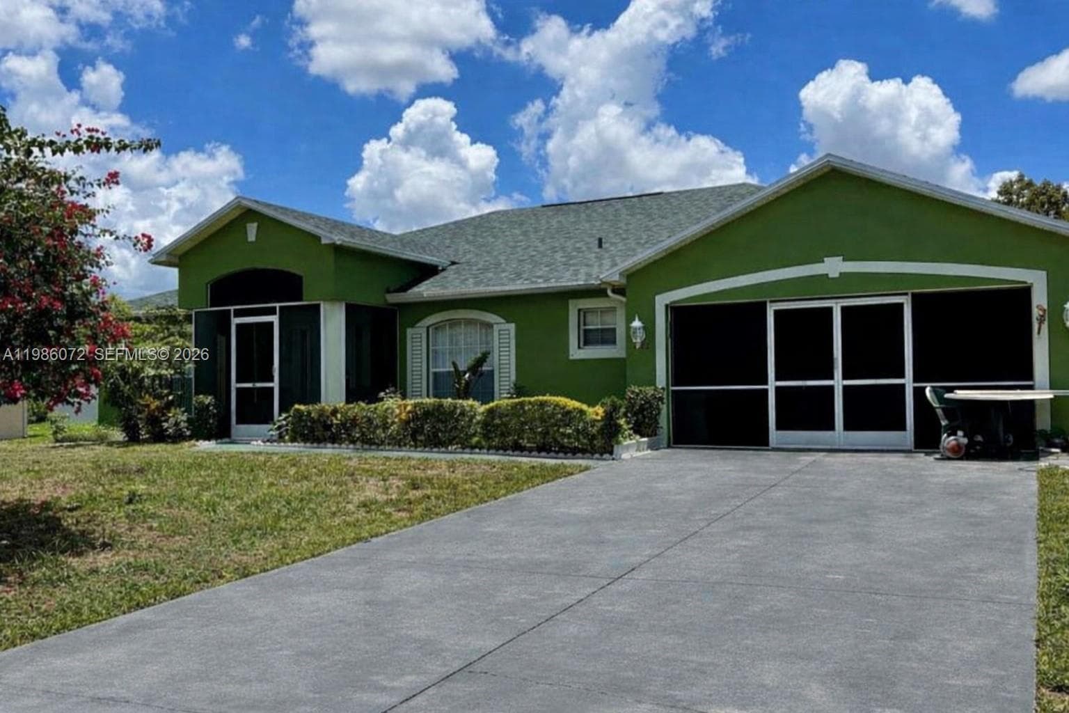 Single-family home at 1122 MCKINLEY AVE, Lehigh Acres, FL