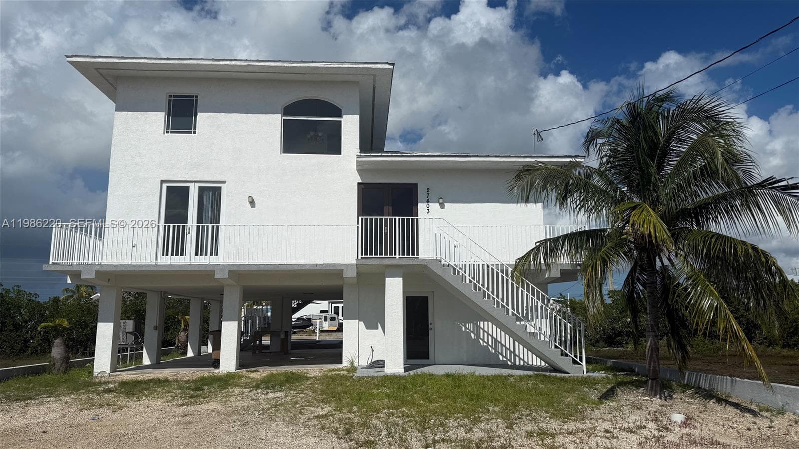 Single-family home at 27403 Antigua Ln, Lower Keys — photo 1