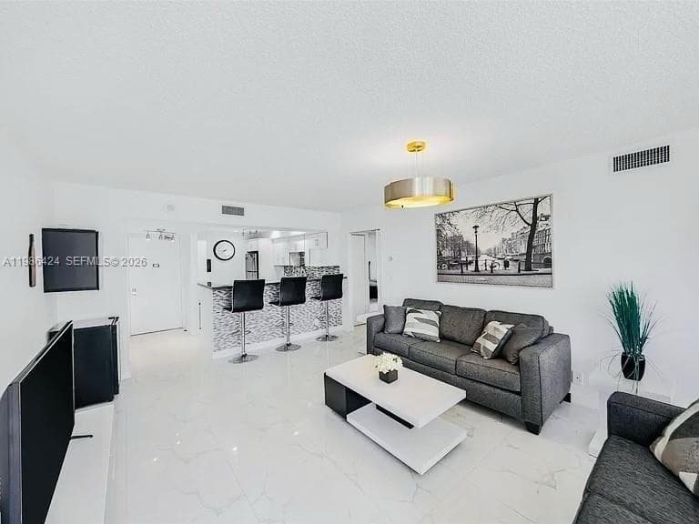 Condo at 20301 W Country Club Dr, Aventura, FL