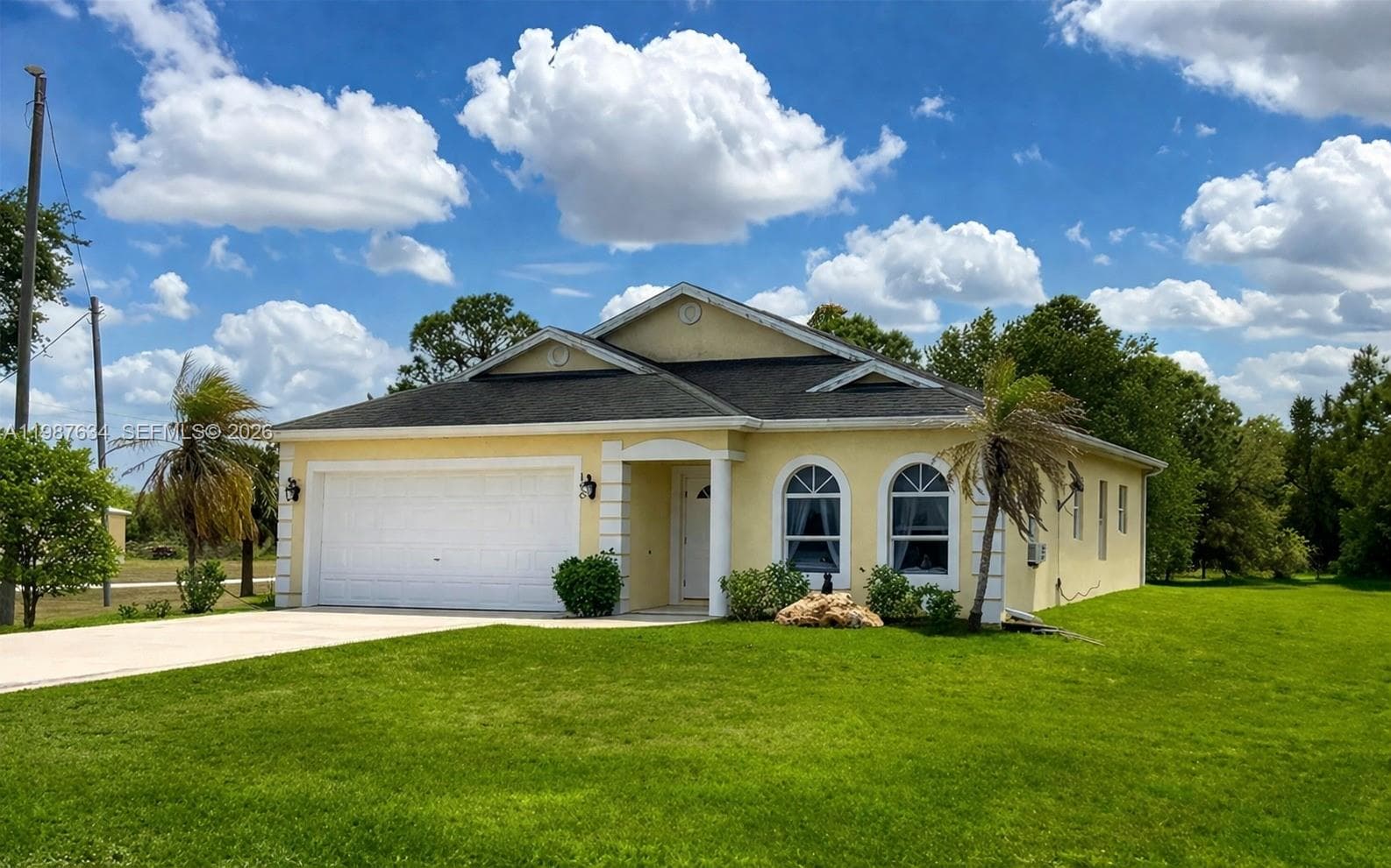 Single-family home at 166 Pine Cone Ave, Clewiston — photo 1