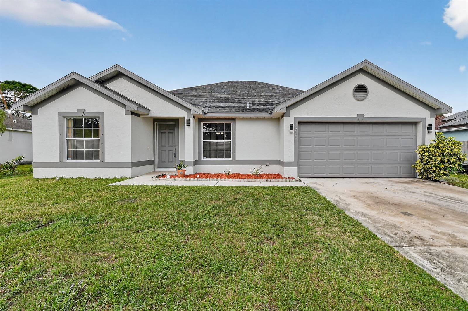 Single-family home at 1714 SE Aneci Street, Port St. Lucie, FL