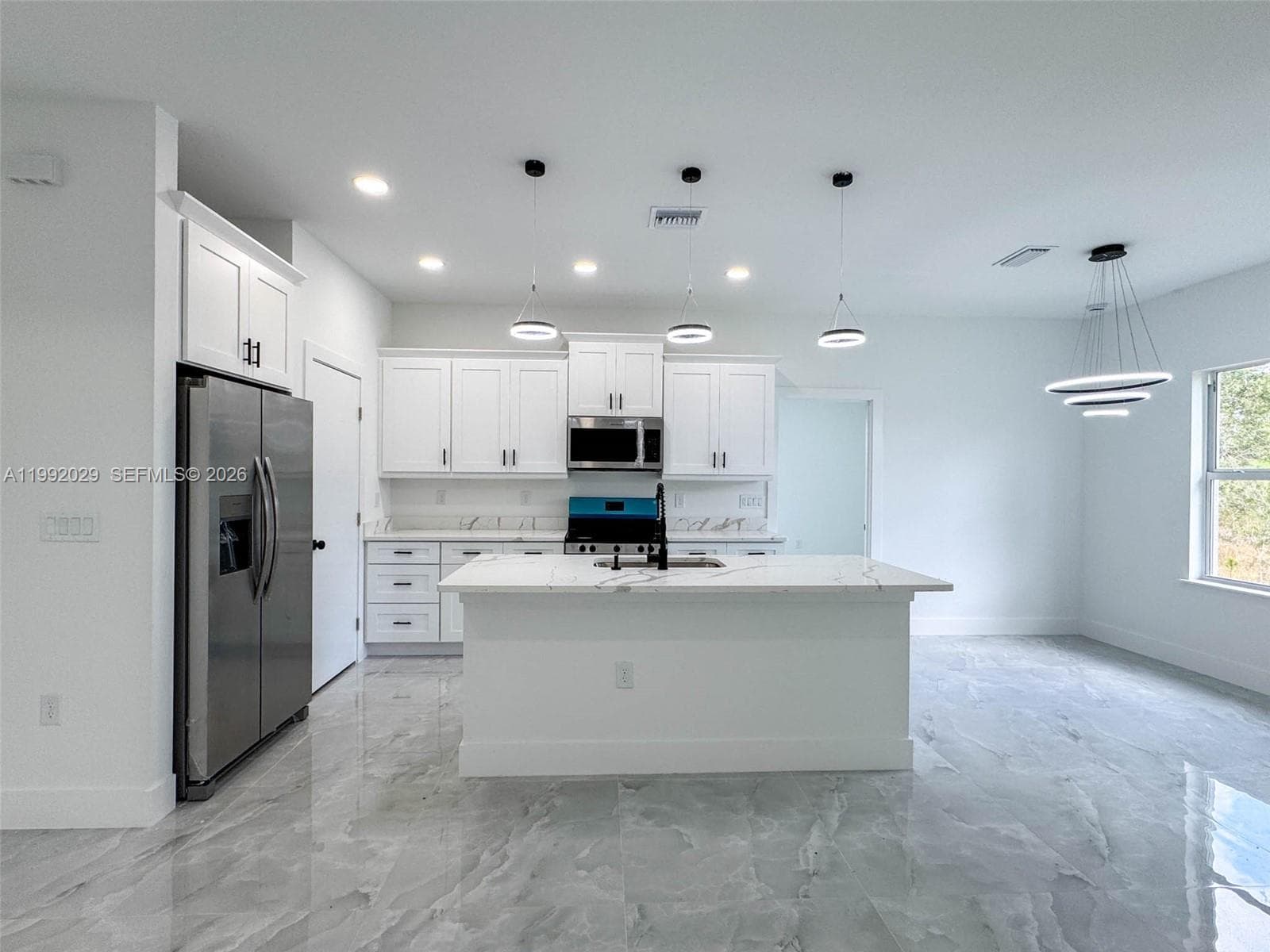 Single-family home at 852 Belden Ave, Lehigh Acres — photo 5