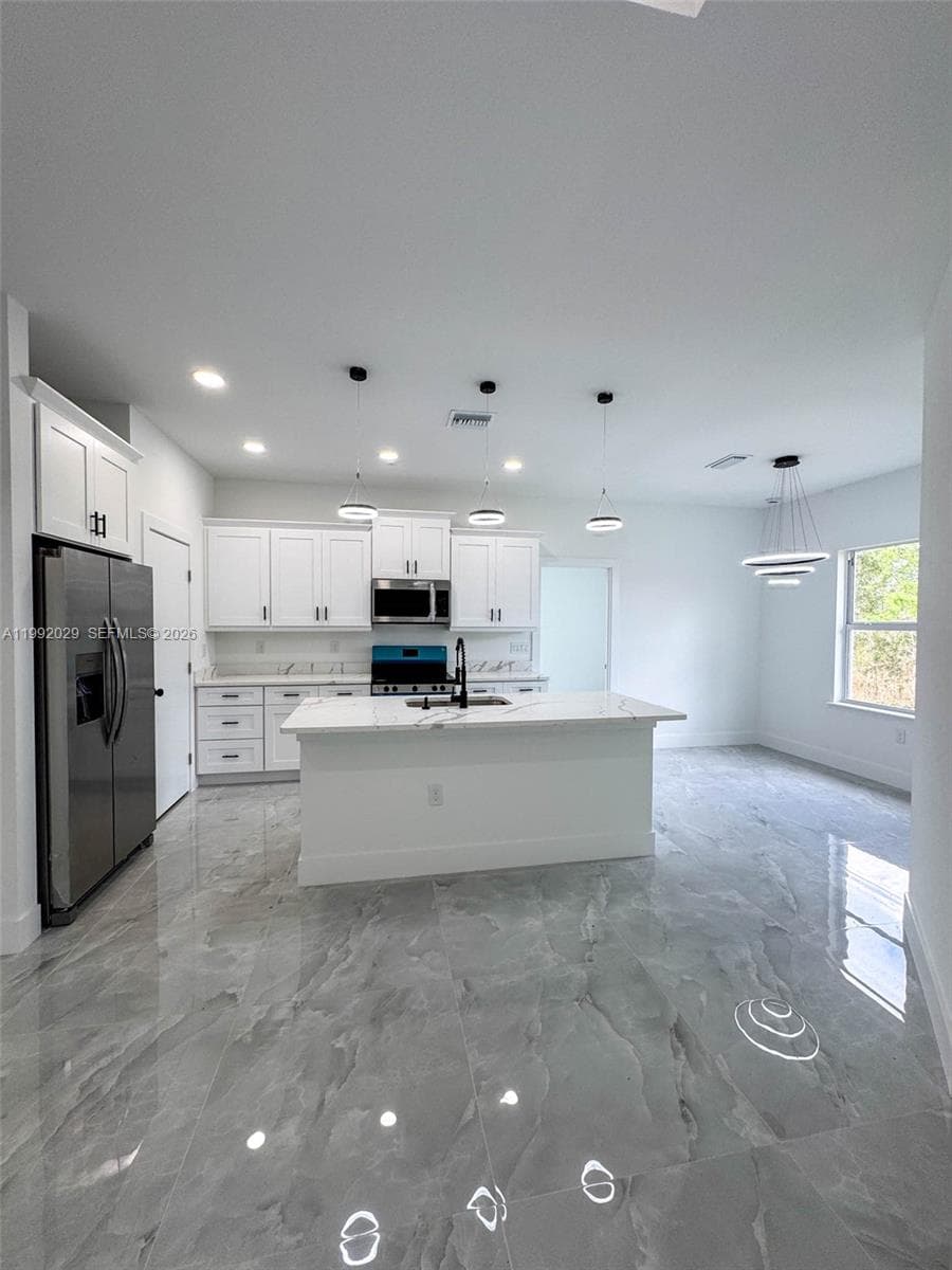 Single-family home at 852 Belden Ave, Lehigh Acres — photo 4