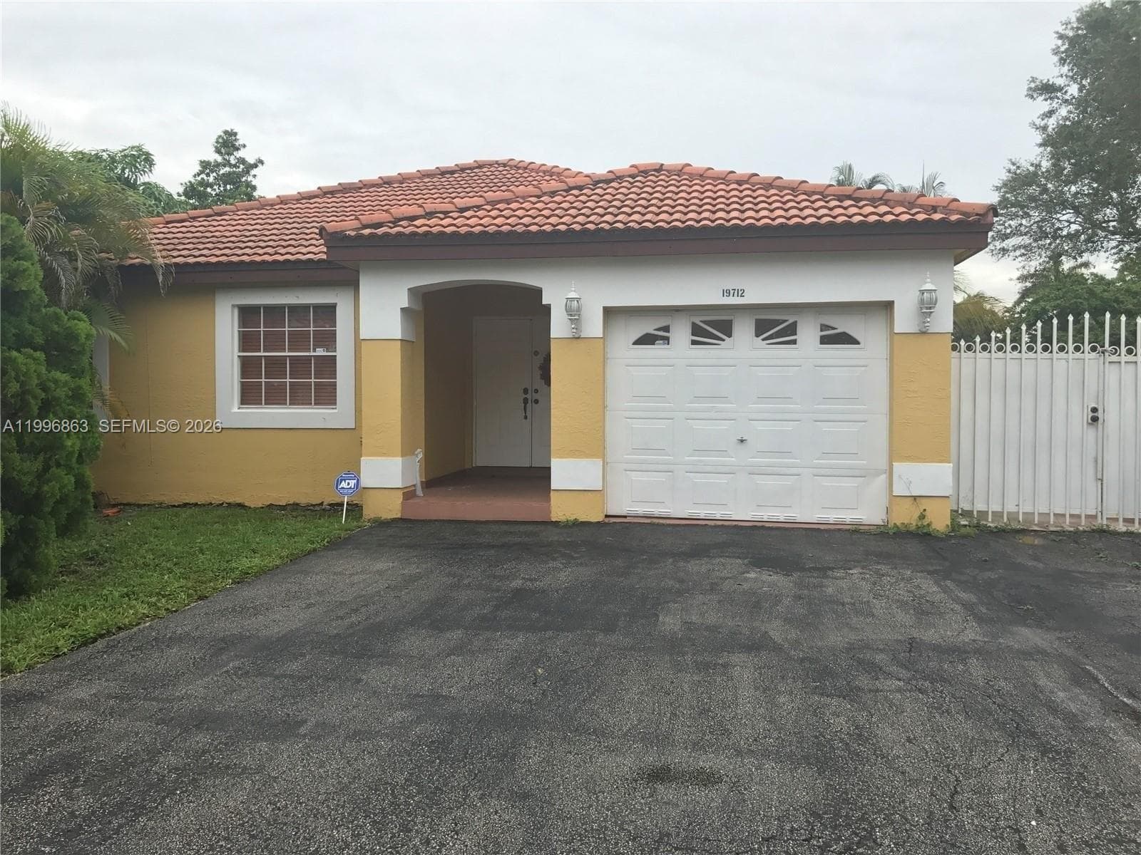 Single-family home at 19712 NW 82nd Pl, Hialeah, FL