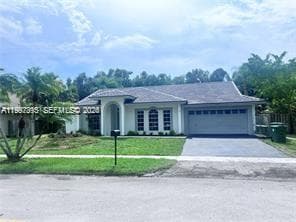 Single-family home at 427 SW 169th Ter, Weston, FL