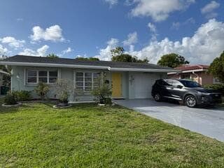 Single-family home at 4919 NW 47th Terrace, Tamarac, FL