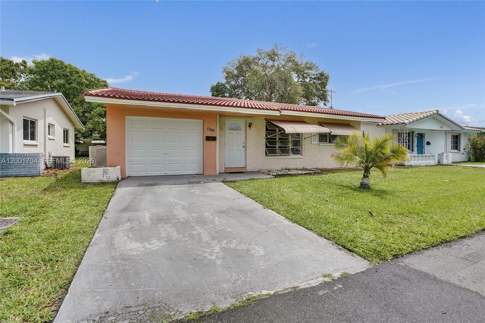 Single-family home at 5712 NW 66th Ave, Tamarac, FL