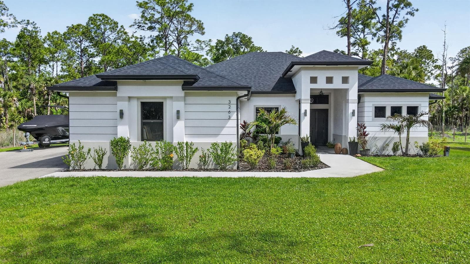 Single-family home at 3263 SE 40th Ave Avenue SE, Naples, FL