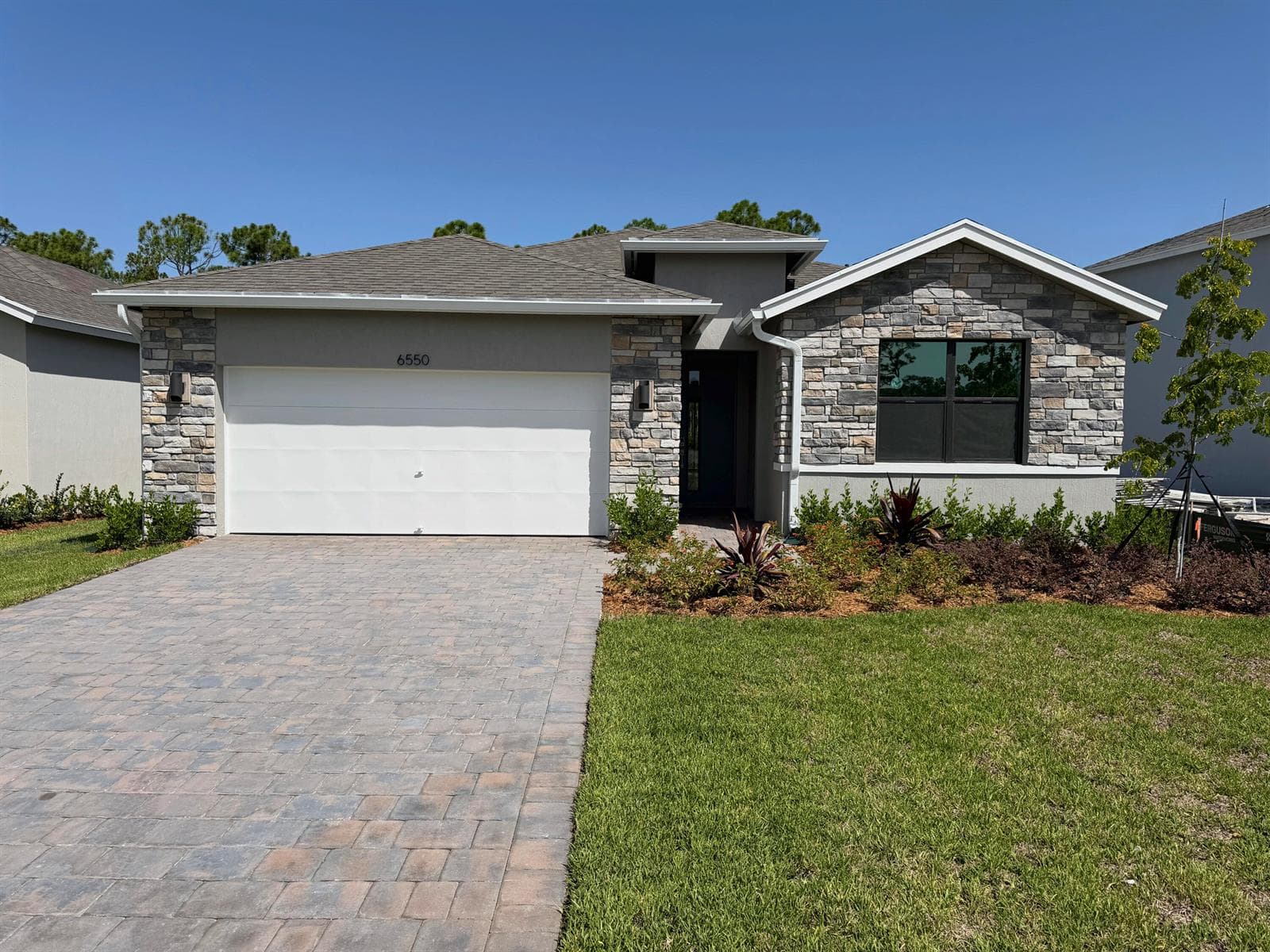 Single-family home at 6550 SE Park Trace Drive, Stuart, FL
