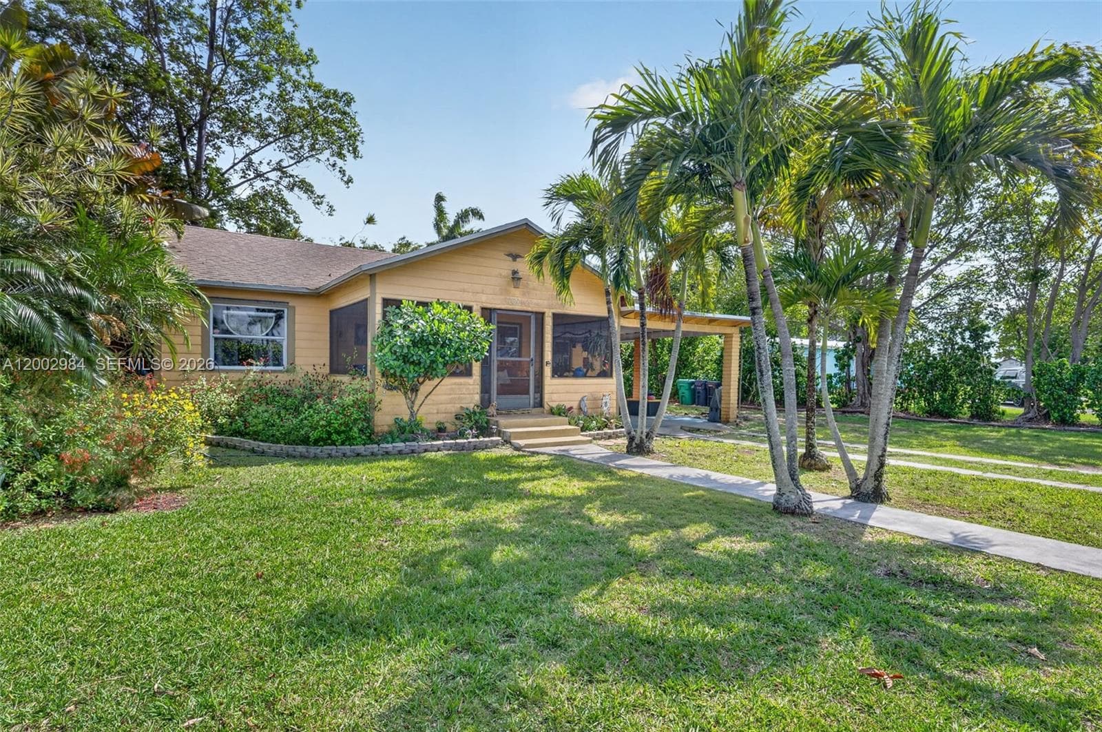 Single-family home at 1490 NW 8th St, Homestead, FL
