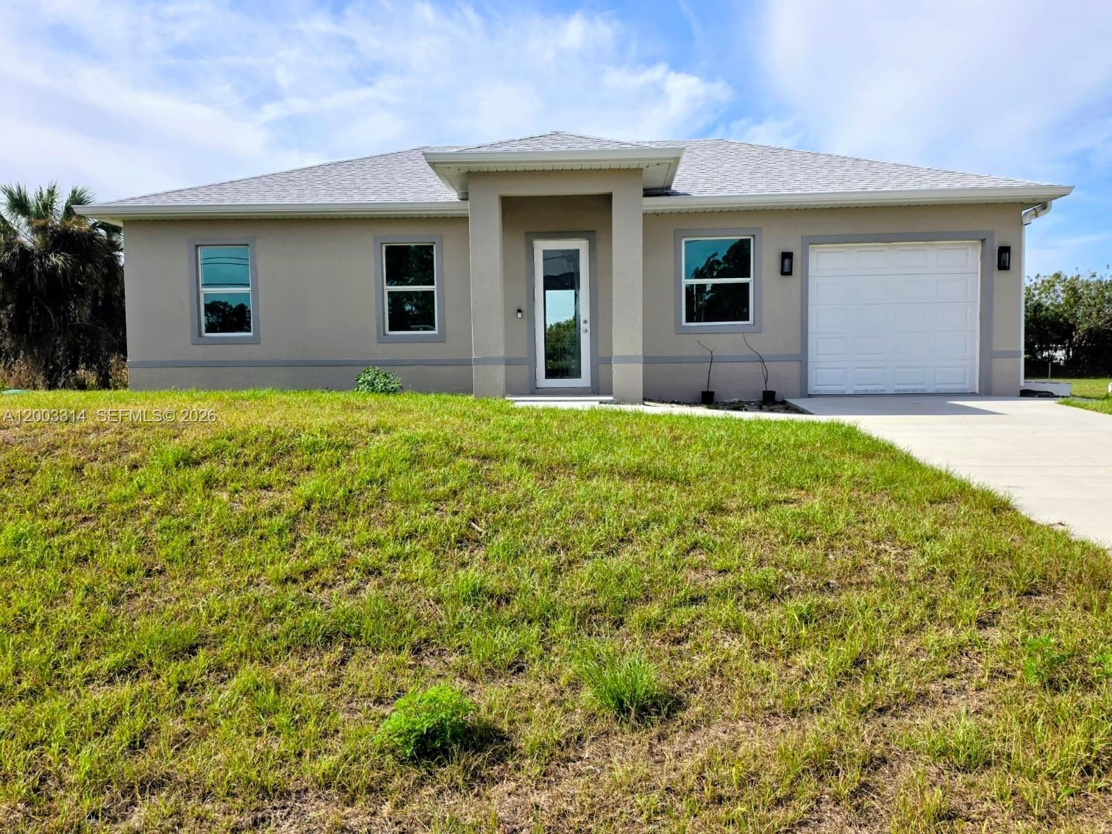 Single-family home at 402 Harrison Dr, Lehigh Acres — photo 1