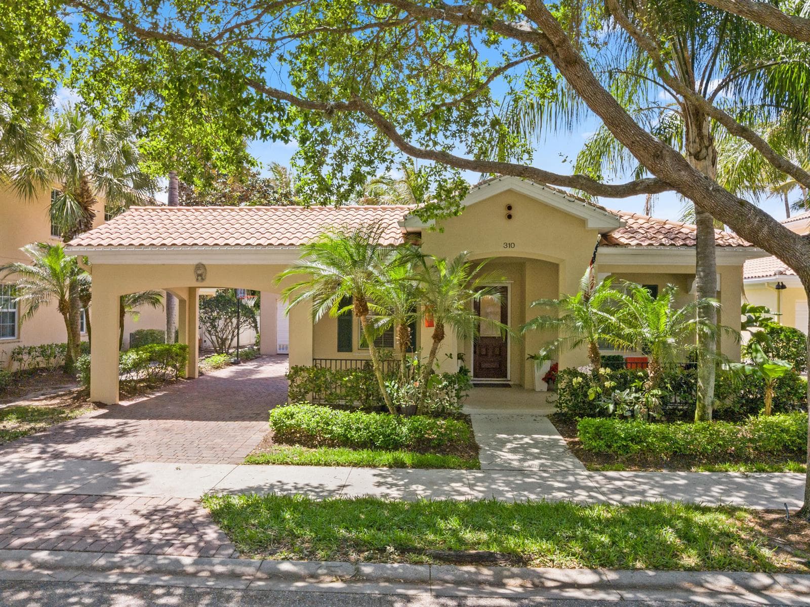 Single-family home at 310 San Remo Drive, Jupiter, FL