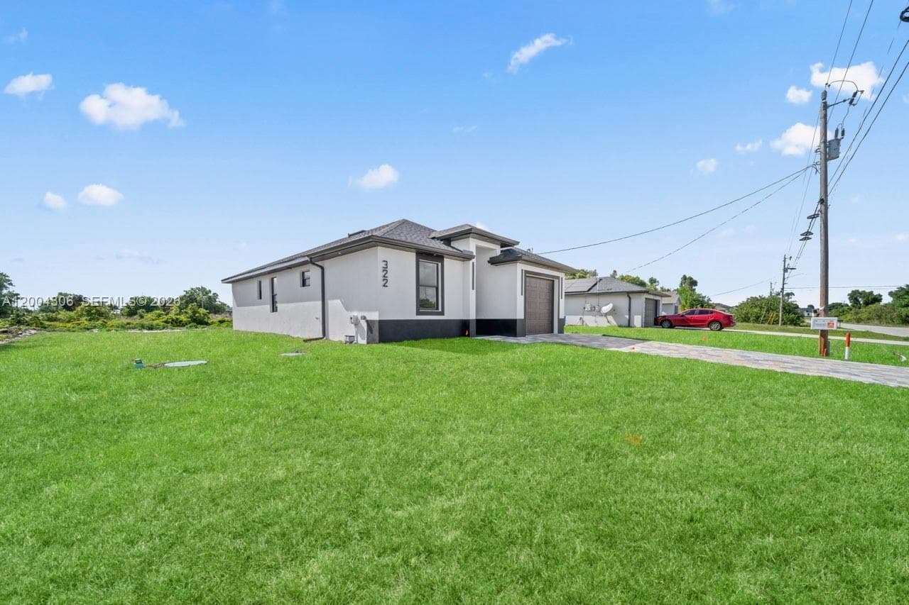 Single-family home at 322 Ranch Ave, Lehigh Acres, FL