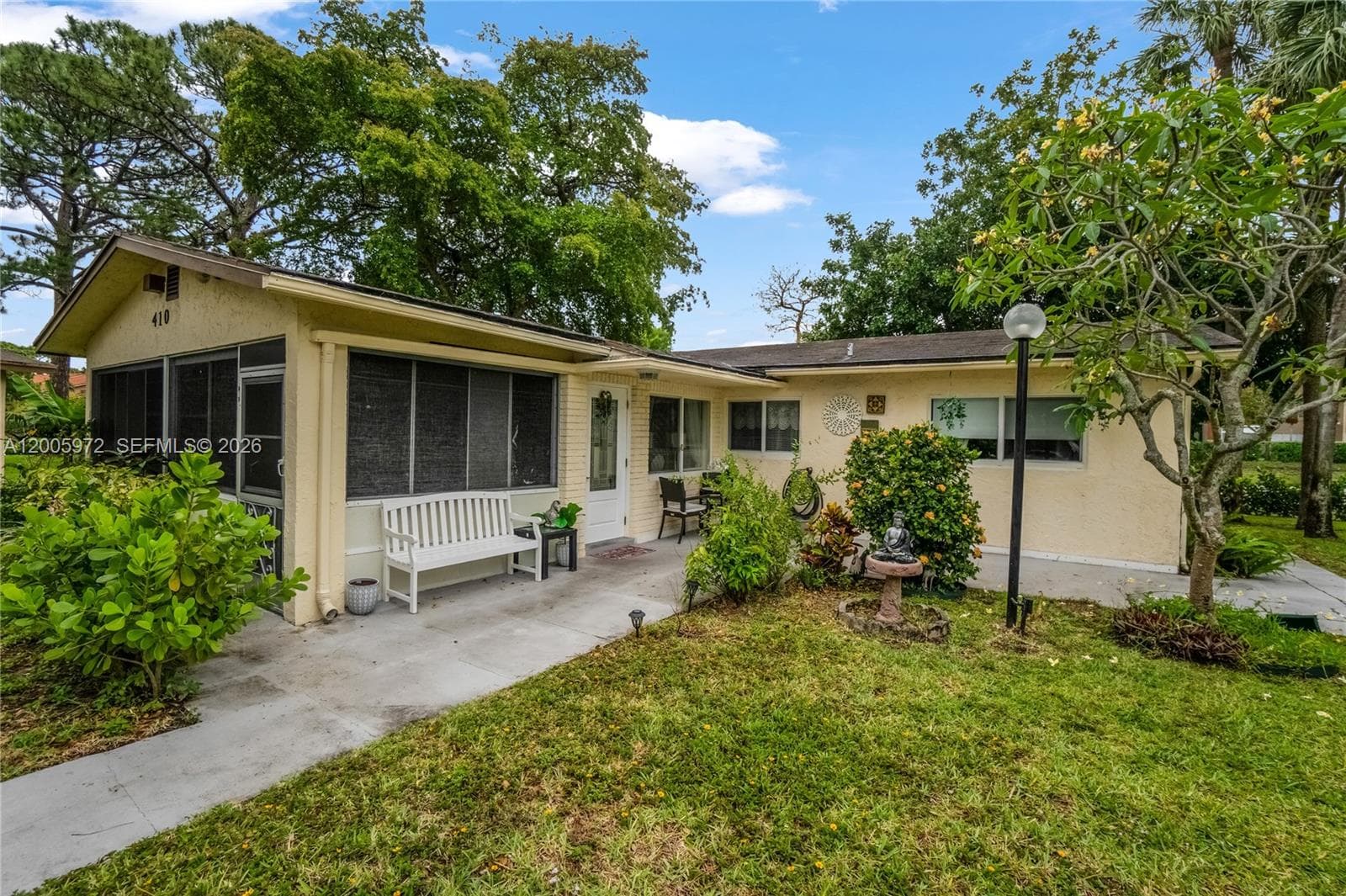 Single-family home at 410 SW Natura Ave, Deerfield Beach, FL