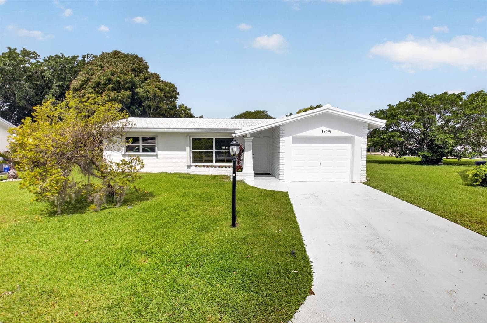Single-family home at 105 NW 8th Place, Boynton Beach, FL