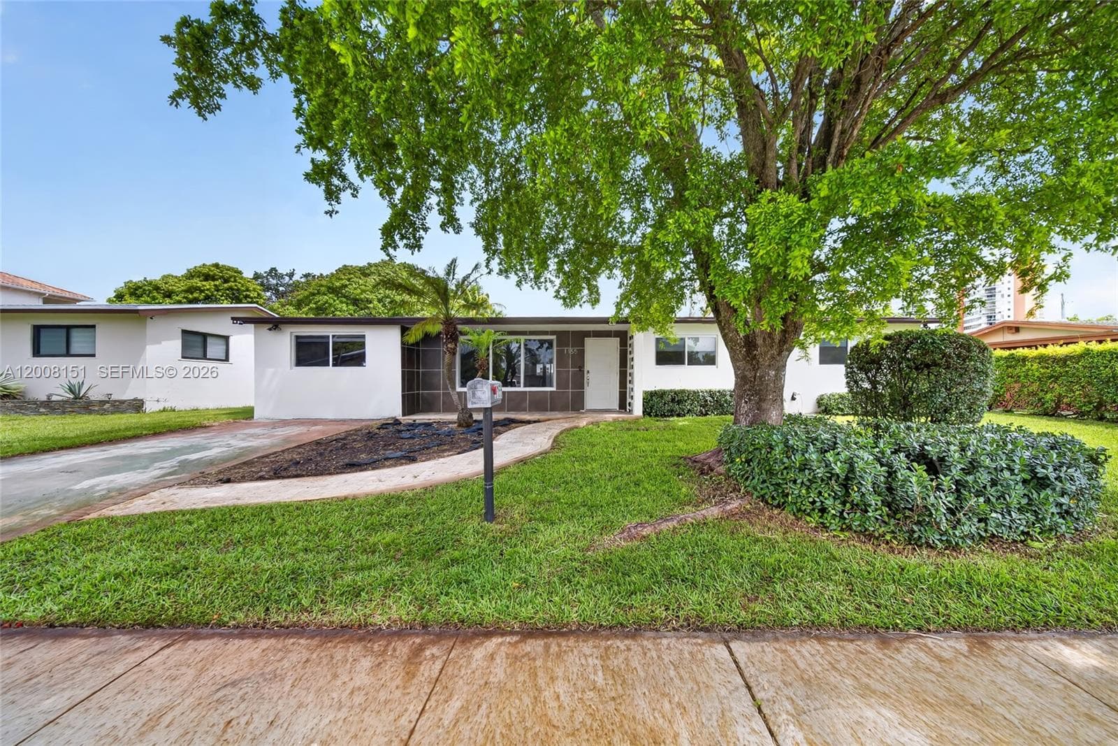 Single-family home at 1155 NE 184th St, Miami — photo 1