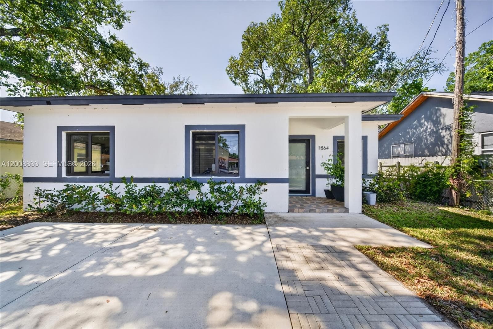 Single-family home at 1864 NW 84th St, Miami — photo 1