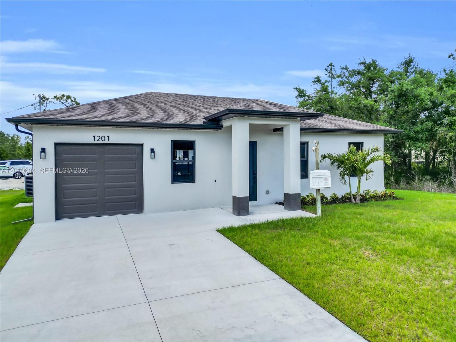 Single-family home at 1201 E 7th ST, Lehigh Acres — photo 1