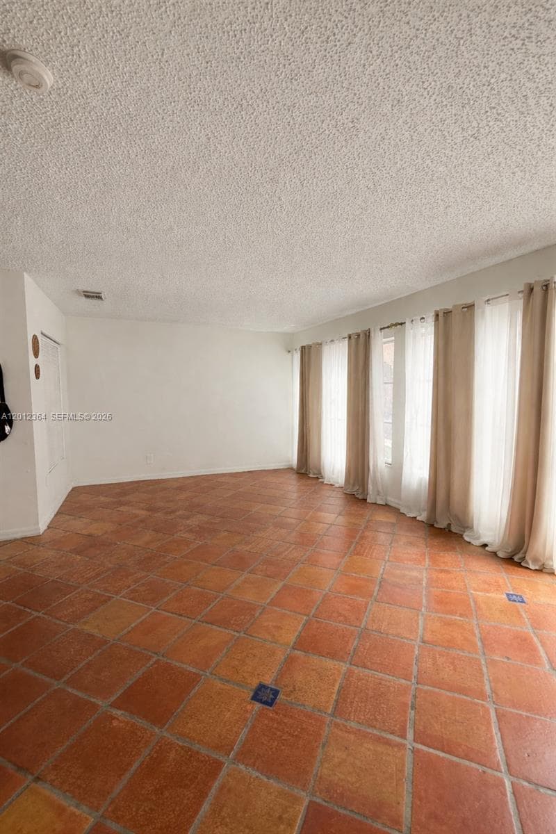 Single-family home at 1045 NW 126th Pl, Miami — photo 2