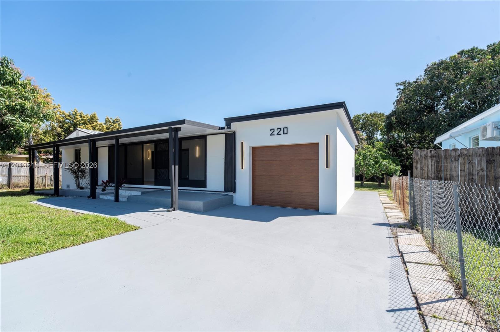 Single-family home at 220 NW 144th St, Miami, FL