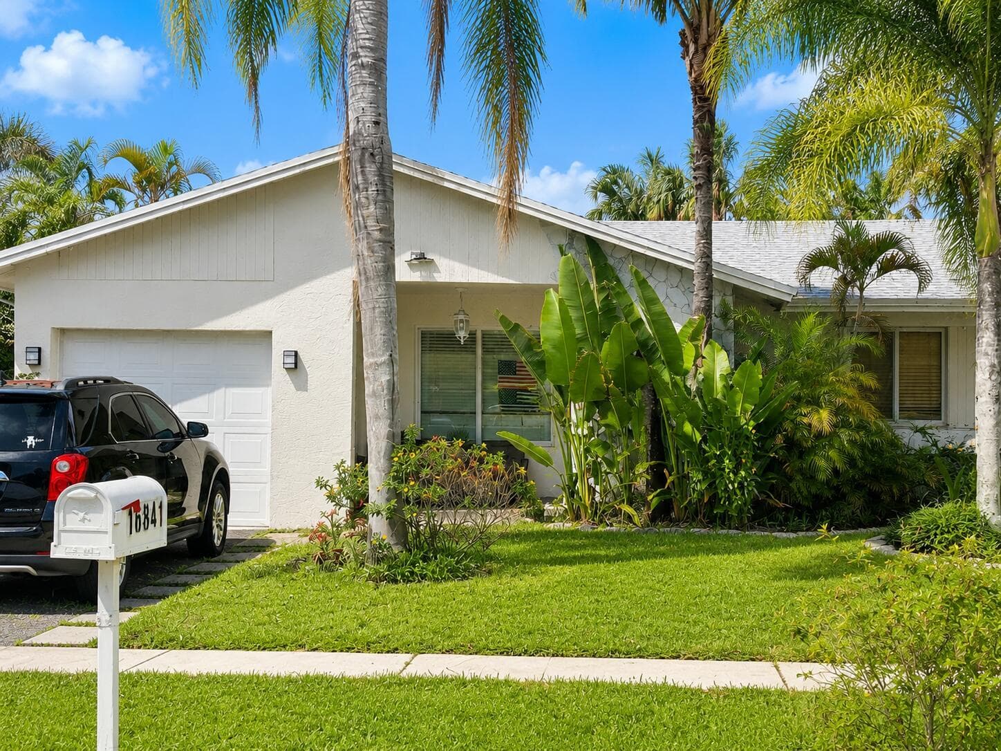 Single-family home at 16841 Royal Poinciana Drive, Weston, FL