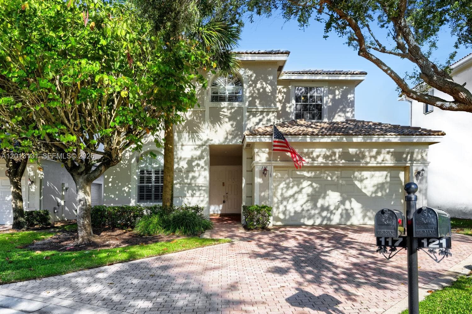 Single-family home at 117 Palm Cir, Atlantis, FL